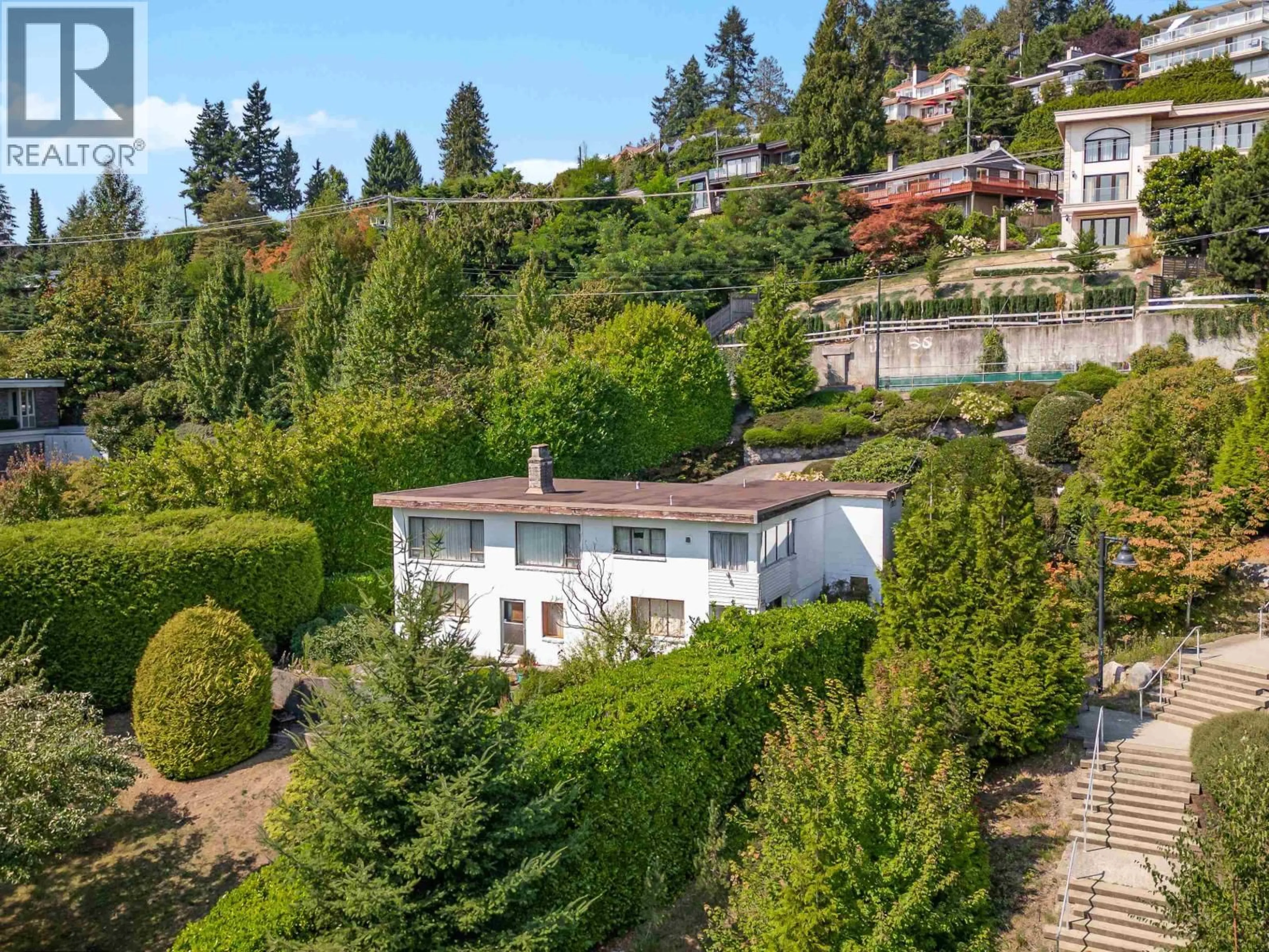 A pic from outside/outdoor area/front of a property/back of a property/a pic from drone, unknown for 940 KEITH ROAD, West Vancouver British Columbia V7T1M3