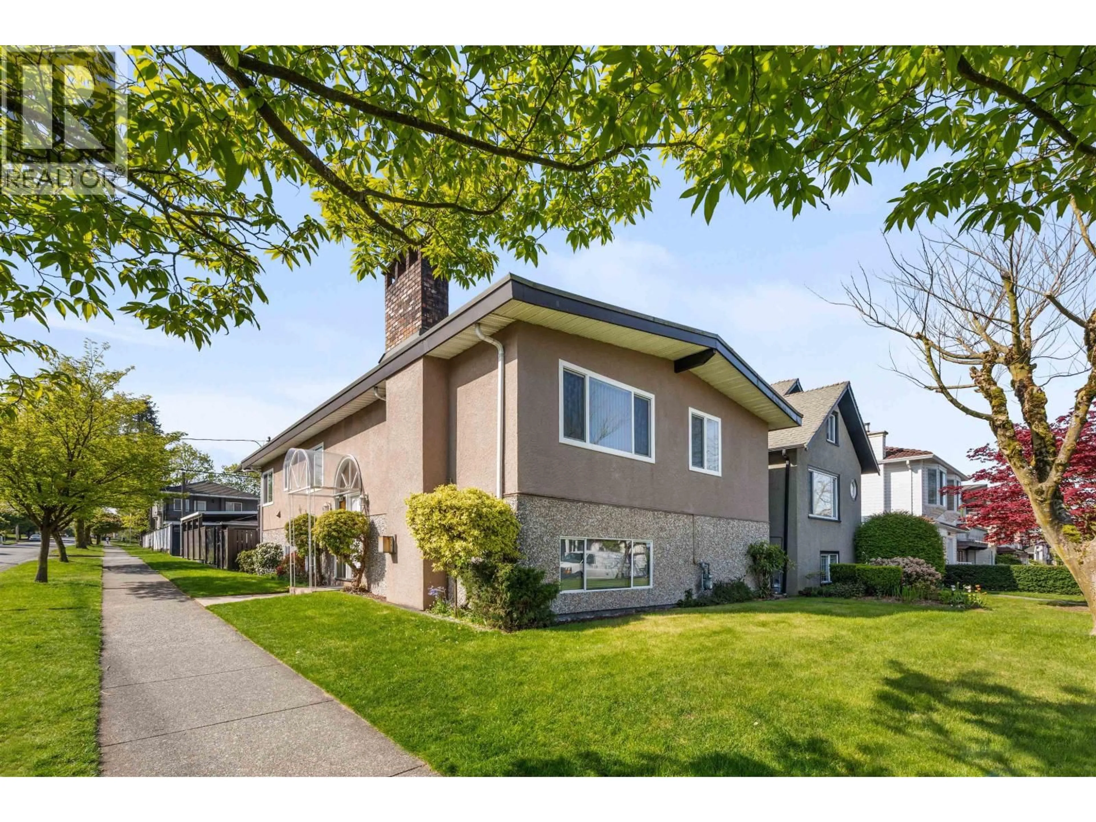 Home with vinyl exterior material, street for 1425 SLOCAN STREET, Vancouver British Columbia V5K4X5