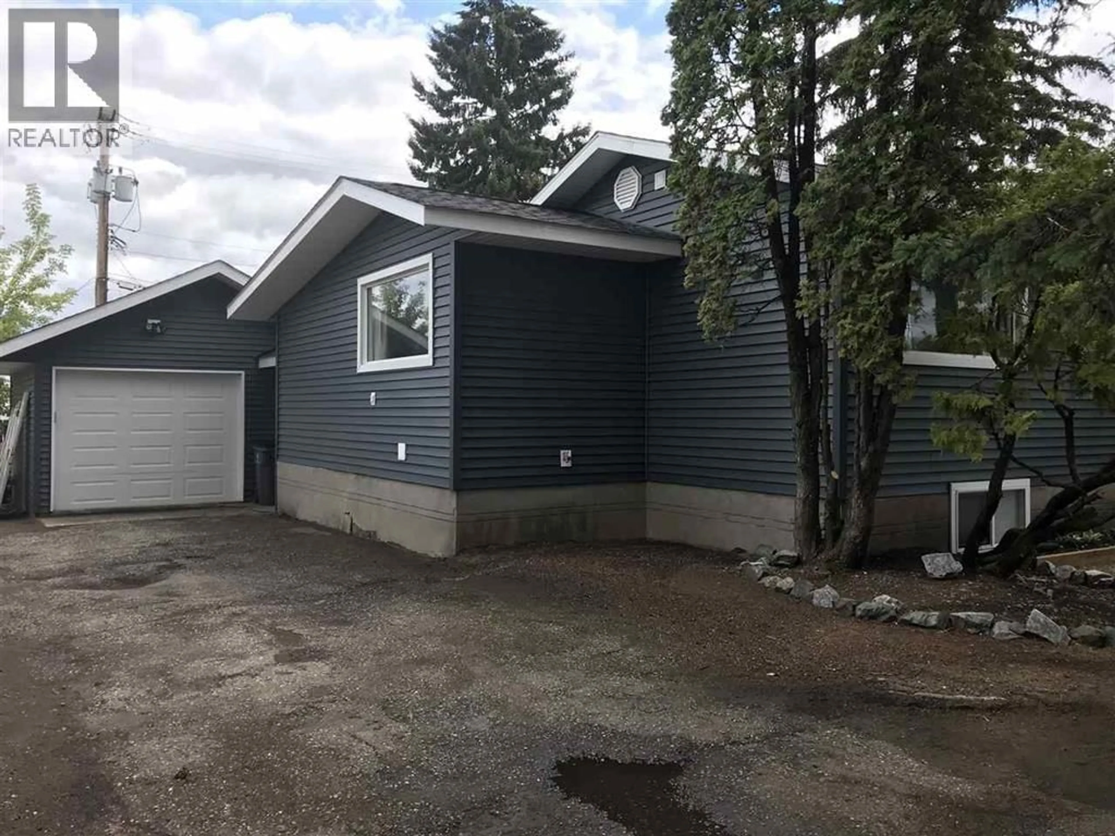 Home with vinyl exterior material, street for 1626 TAMARACK STREET, Prince George British Columbia V2L2T3