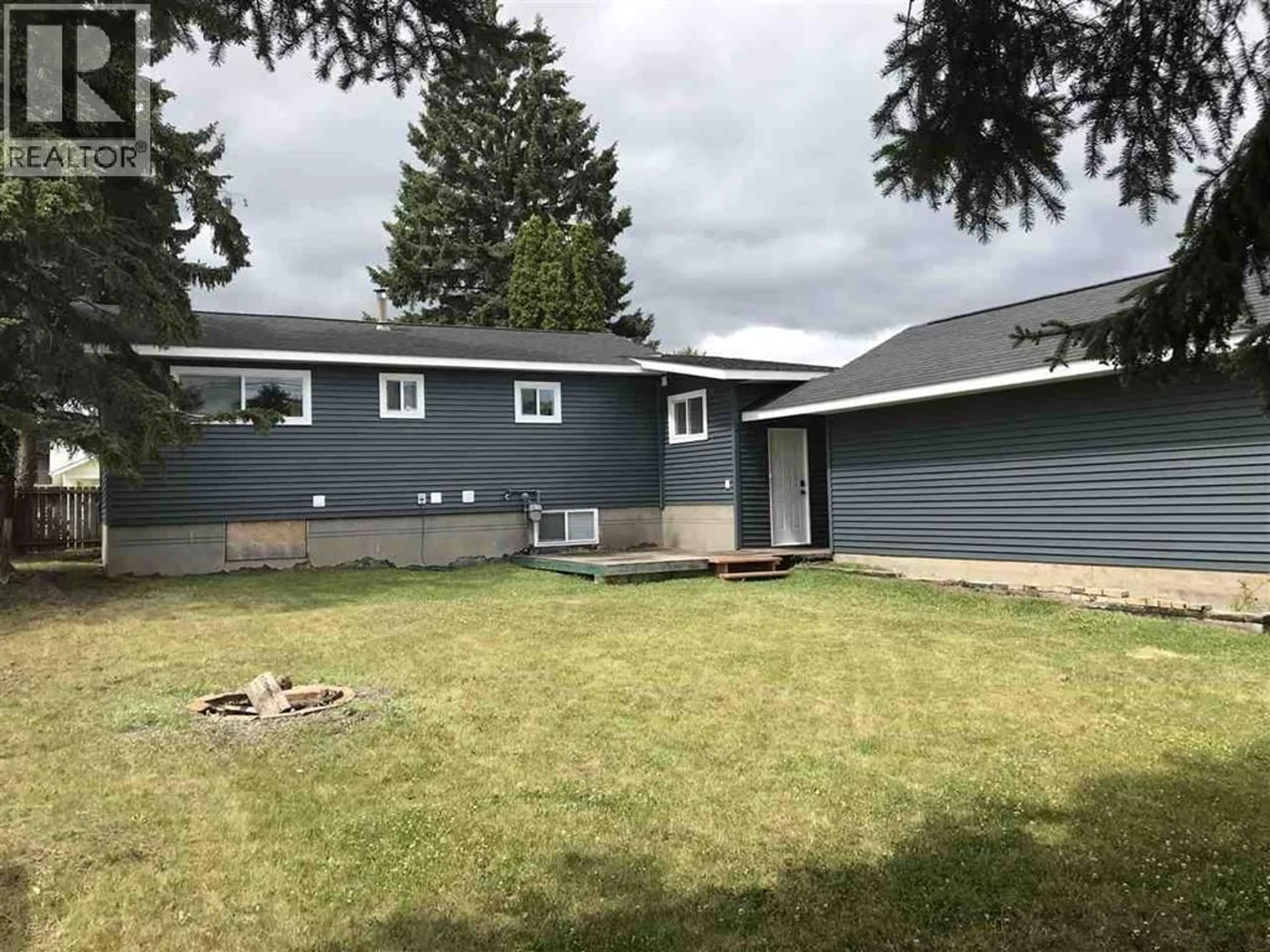 Home with vinyl exterior material, street for 1626 TAMARACK STREET, Prince George British Columbia V2L2T3