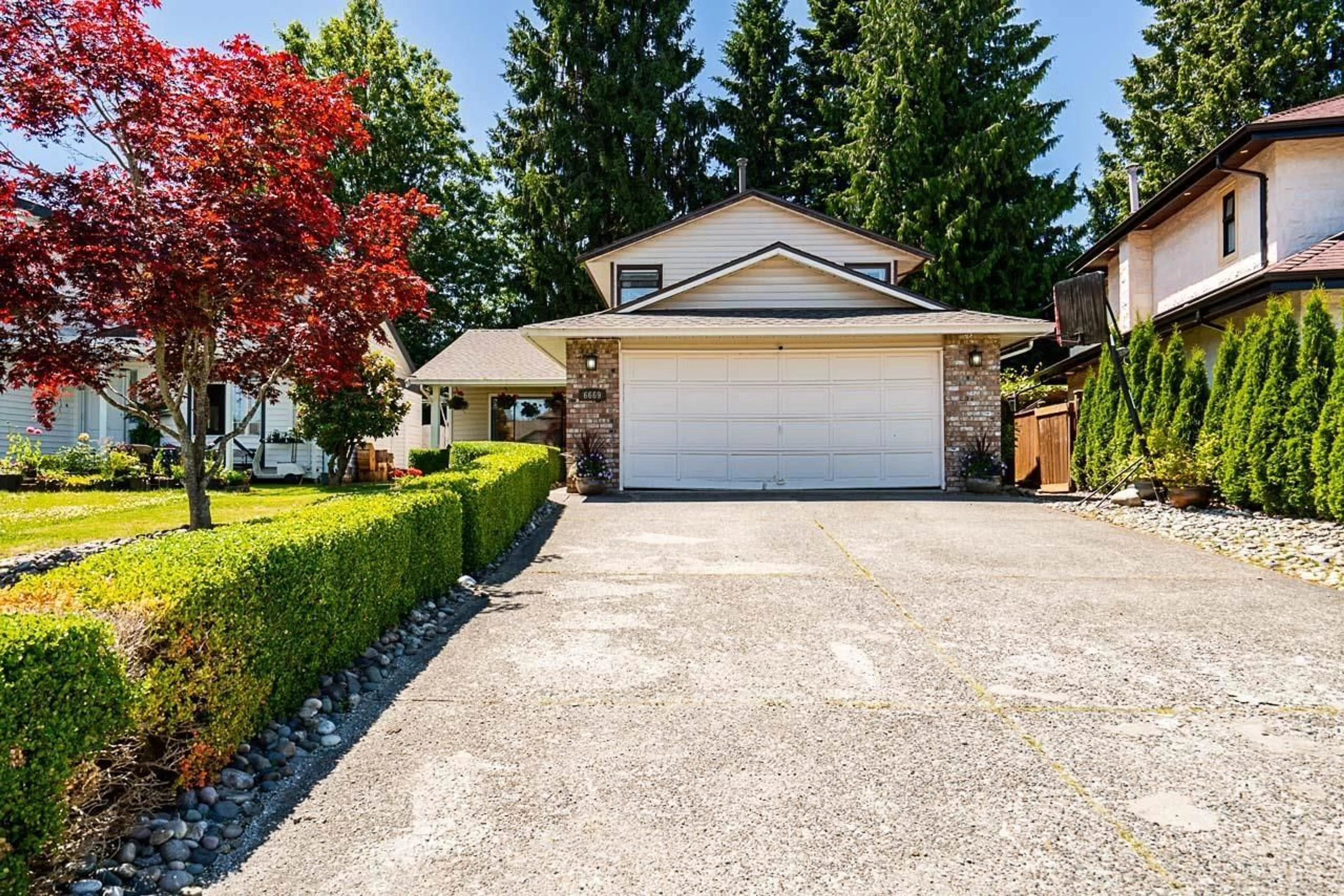Home with vinyl exterior material, street for 6669 129, Surrey British Columbia V3W8Y1
