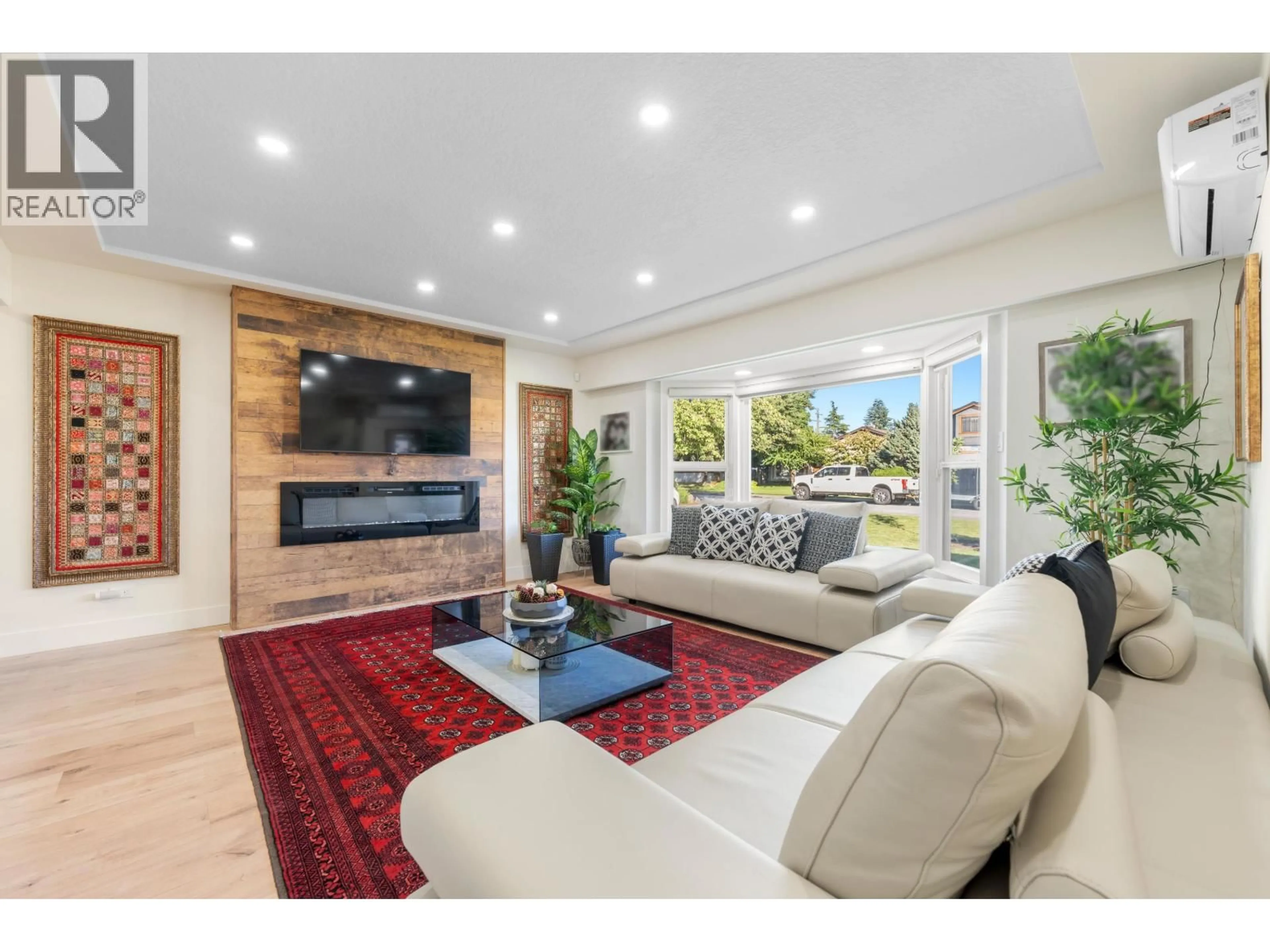 Living room with furniture, wood/laminate floor for 8649 11TH AVENUE, Burnaby British Columbia V3N2P9