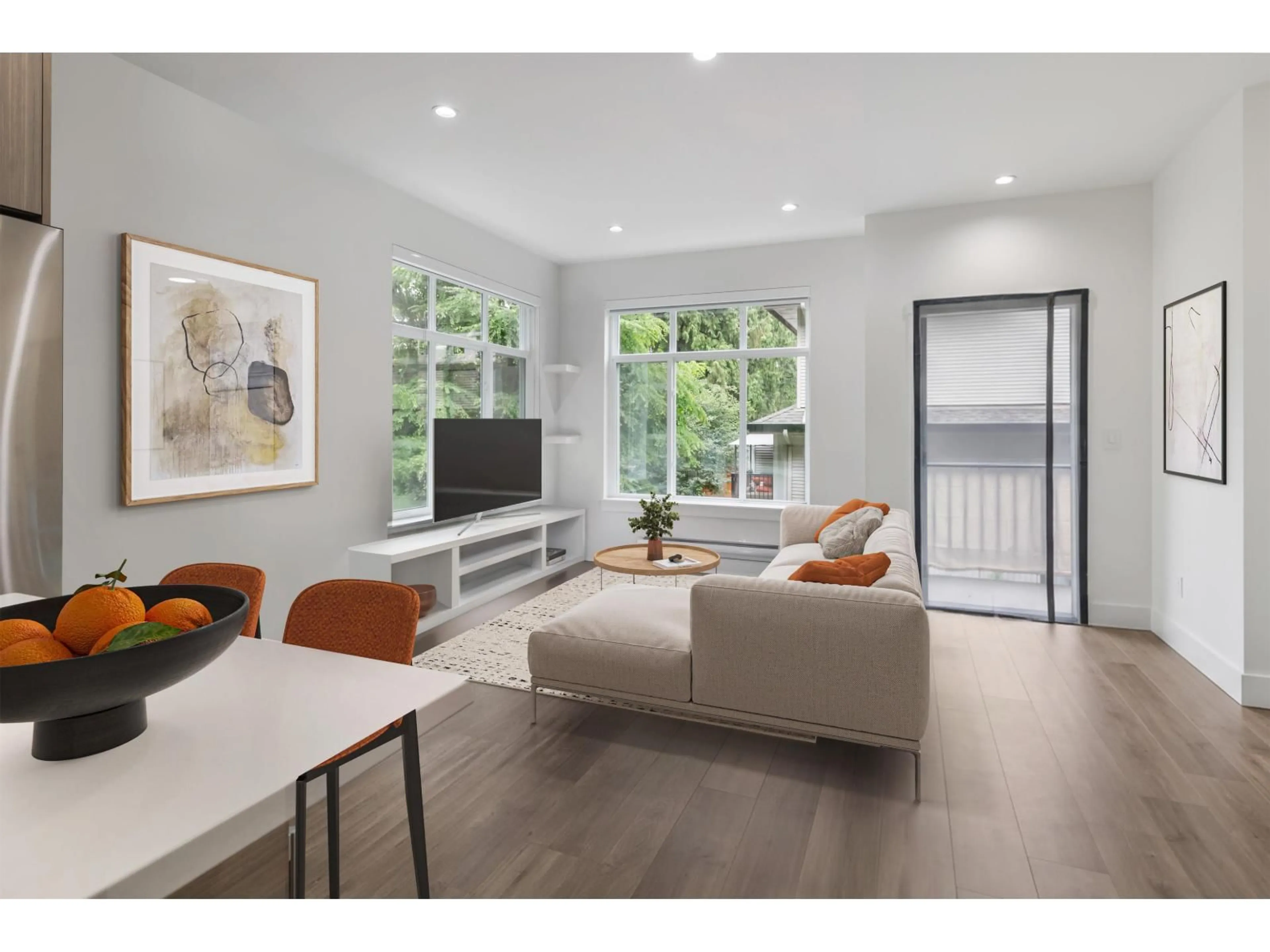 Living room with furniture, wood/laminate floor for 11 - 8137 164, Surrey British Columbia V4N0P1
