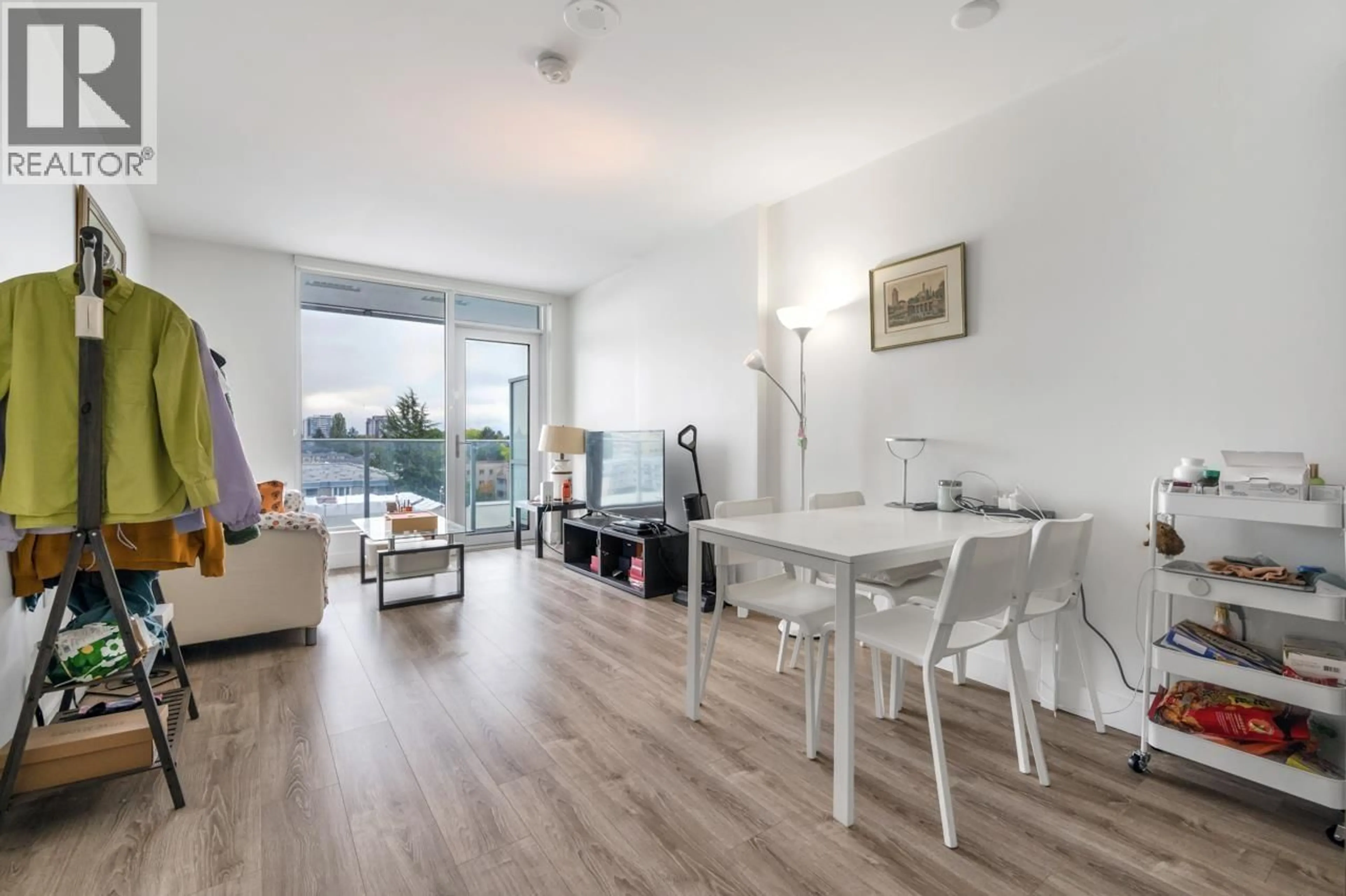 Living room with furniture, wood/laminate floor for 720 - 6328 NO. 3 ROAD, Richmond British Columbia V6Y0L6