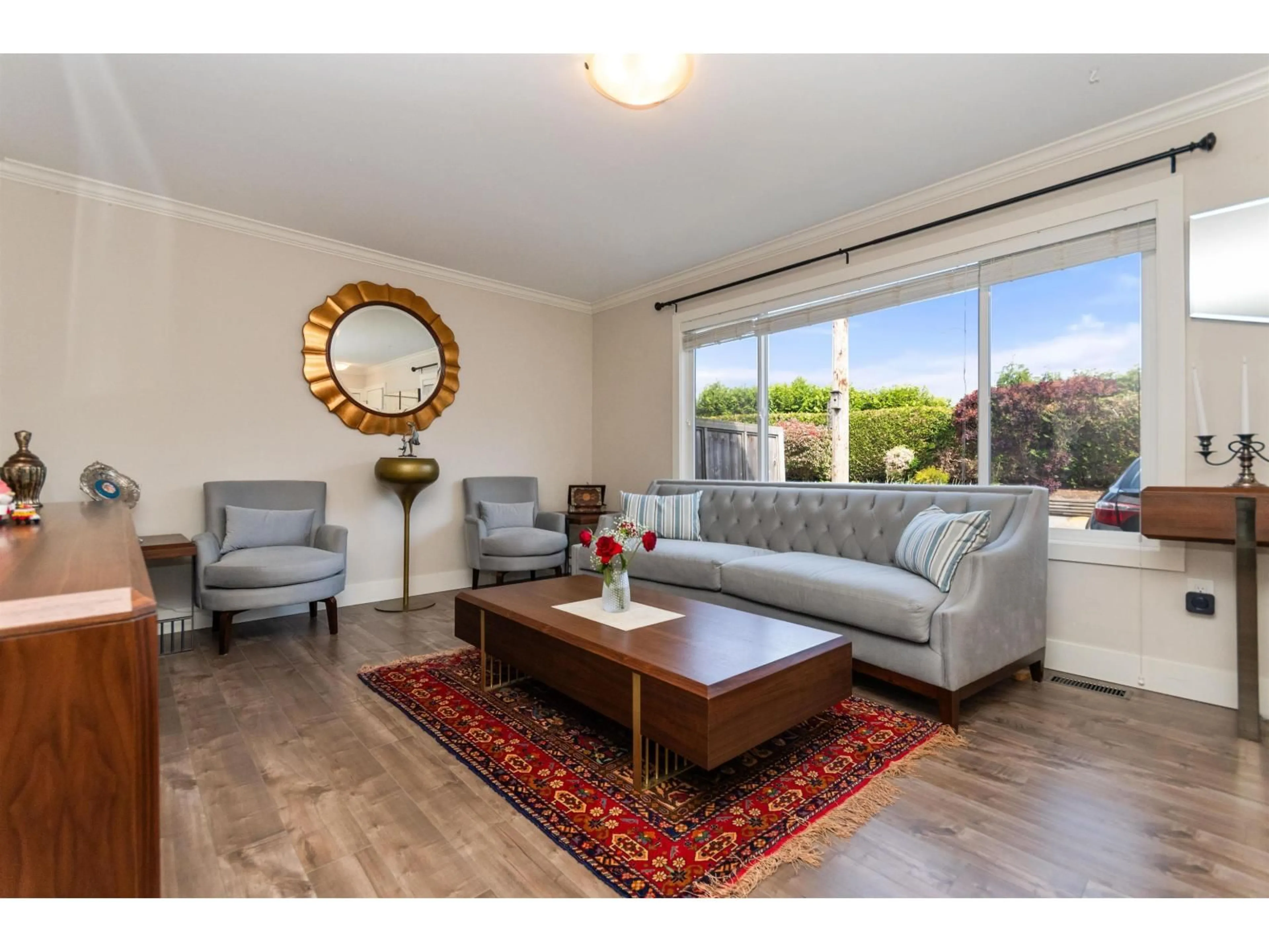 Living room with furniture, wood/laminate floor for 3 - 5648 VEDDER ROAD, Chilliwack British Columbia V2R3M8
