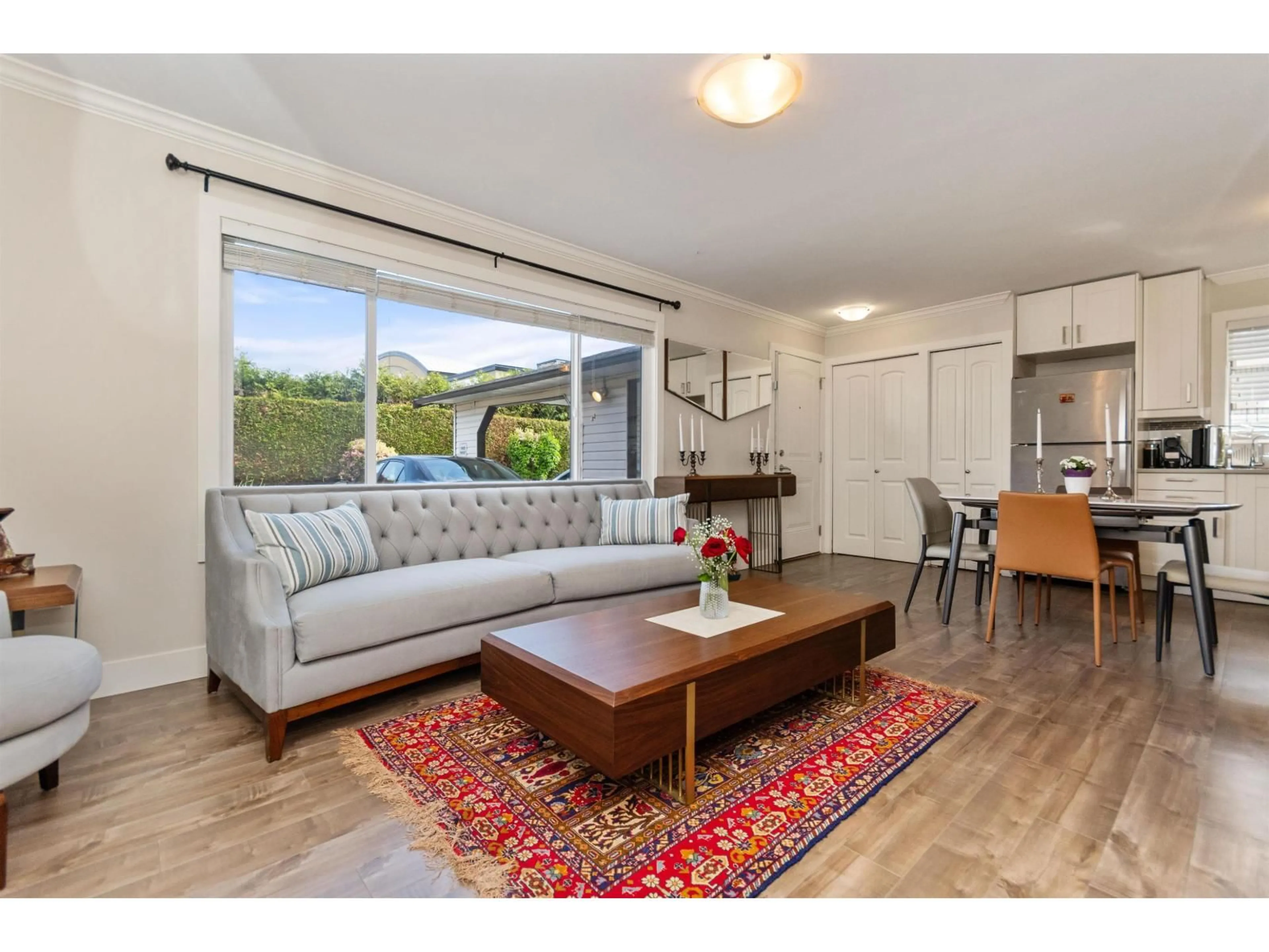 Living room with furniture, wood/laminate floor for 3 - 5648 VEDDER ROAD, Chilliwack British Columbia V2R3M8