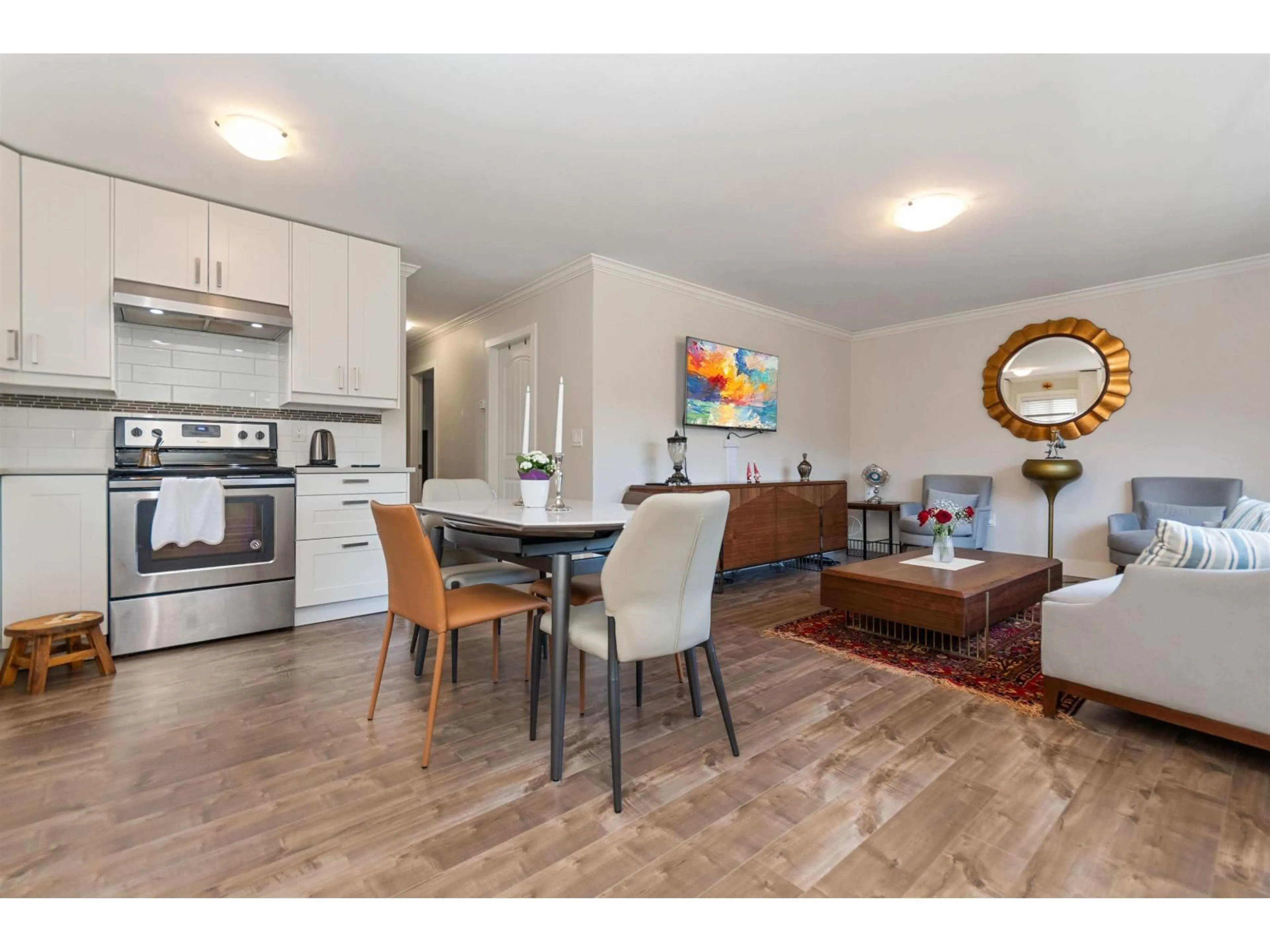 Open concept kitchen, wood/laminate floor for 3 - 5648 VEDDER ROAD, Chilliwack British Columbia V2R3M8