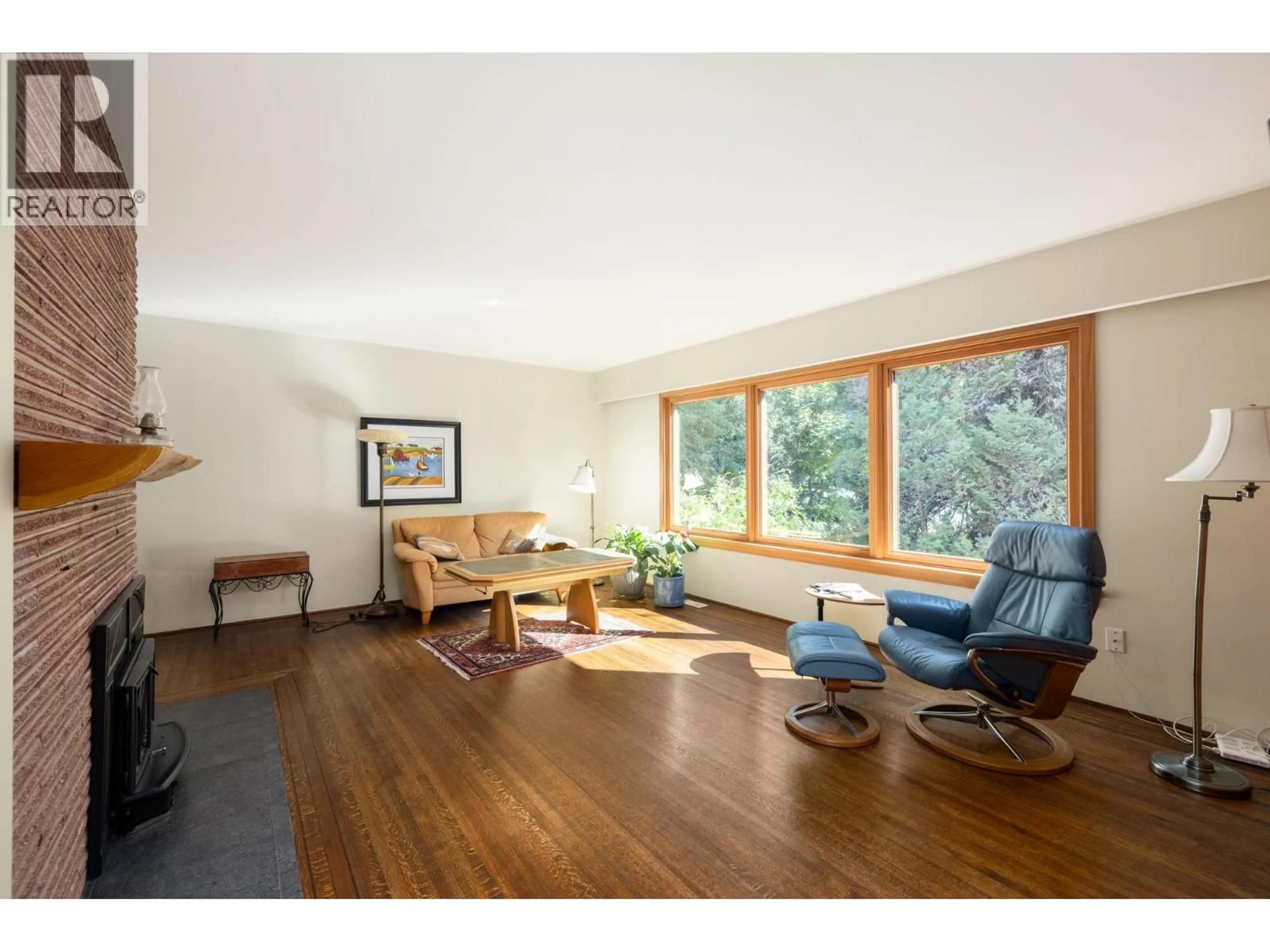 Living room with furniture, wood/laminate floor for 3025 PRINCESS AVENUE, North Vancouver British Columbia V7N2E1