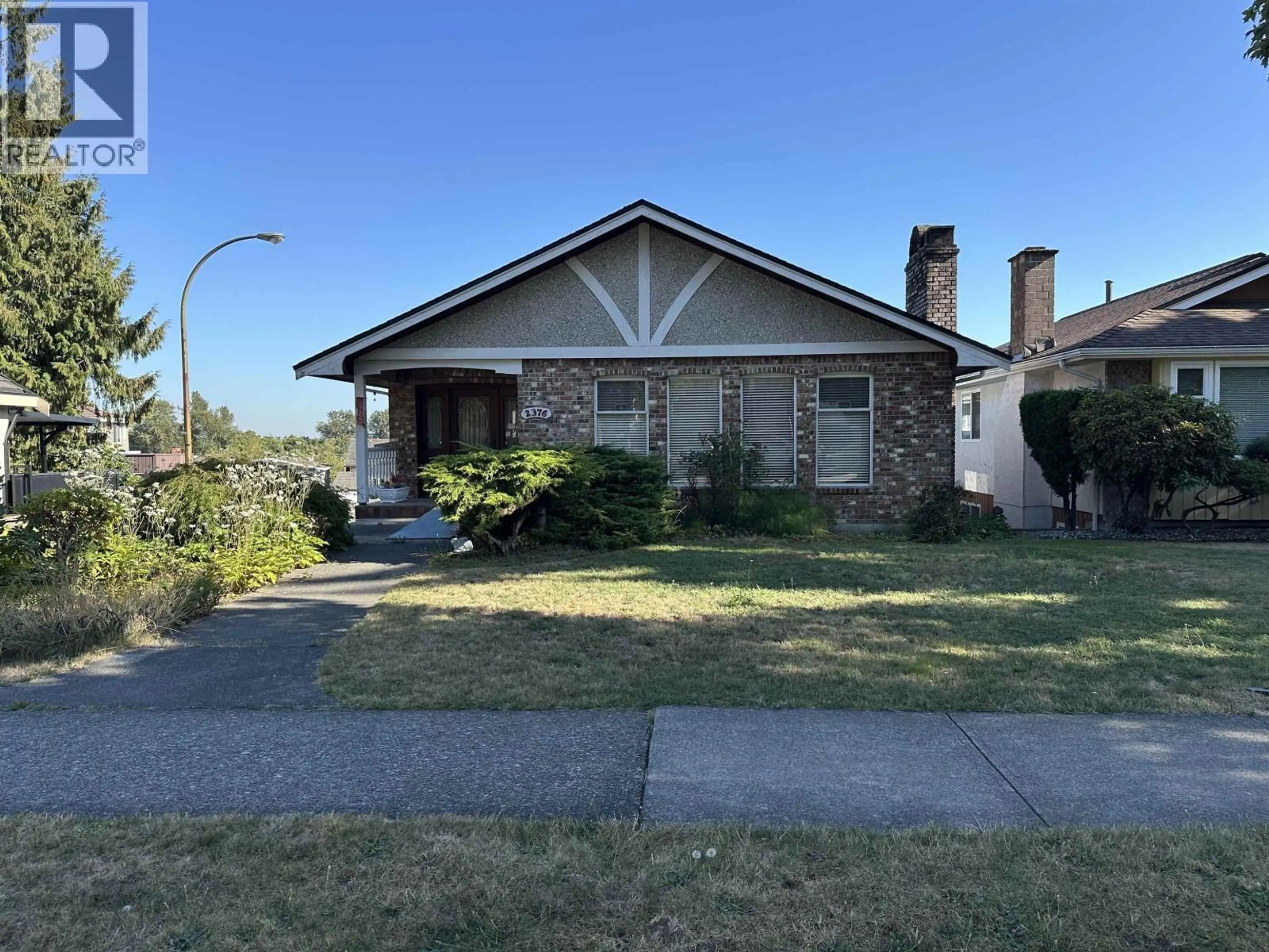 Home with brick exterior material, street for 2376 FRASERVIEW DRIVE, Vancouver British Columbia V5P2N4