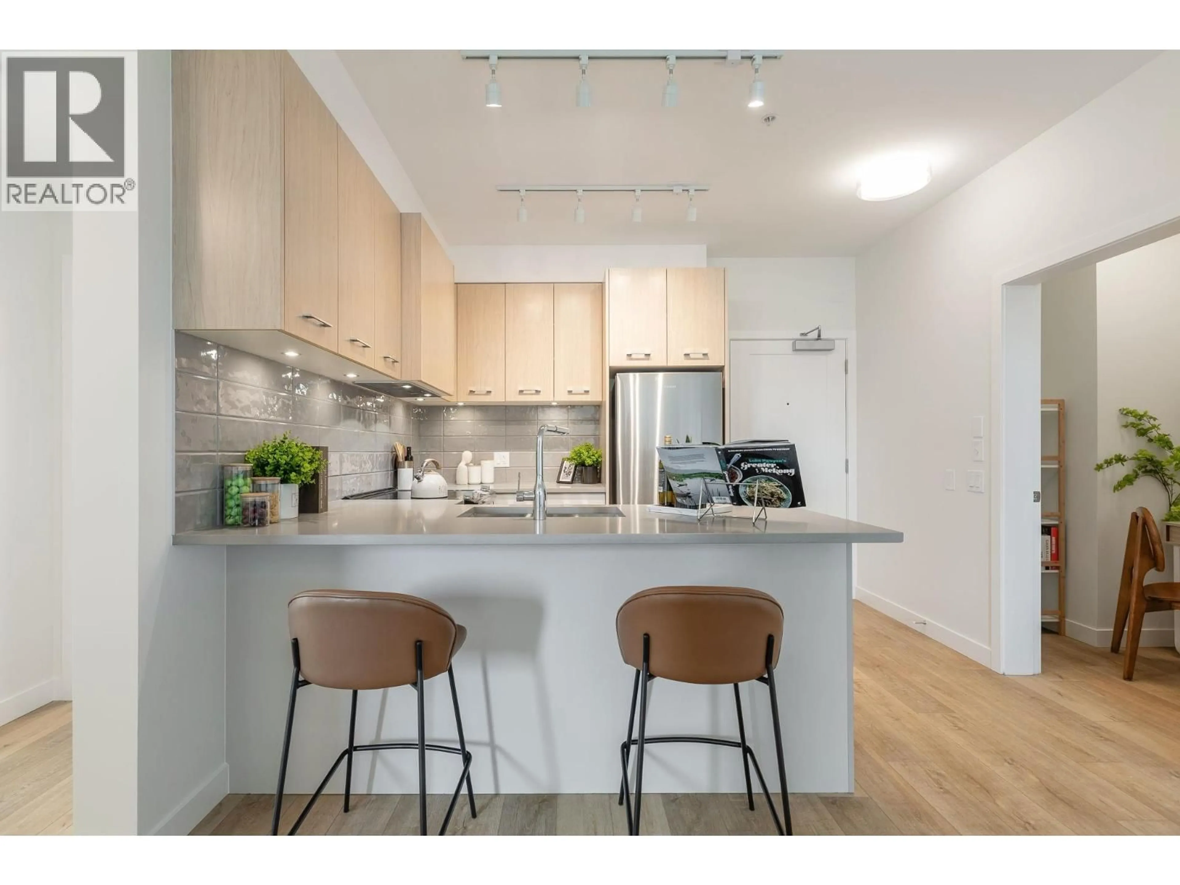 Standard kitchen, wood/laminate floor for 203 - 4933 CLARENDON STREET, Vancouver British Columbia V5R0J6