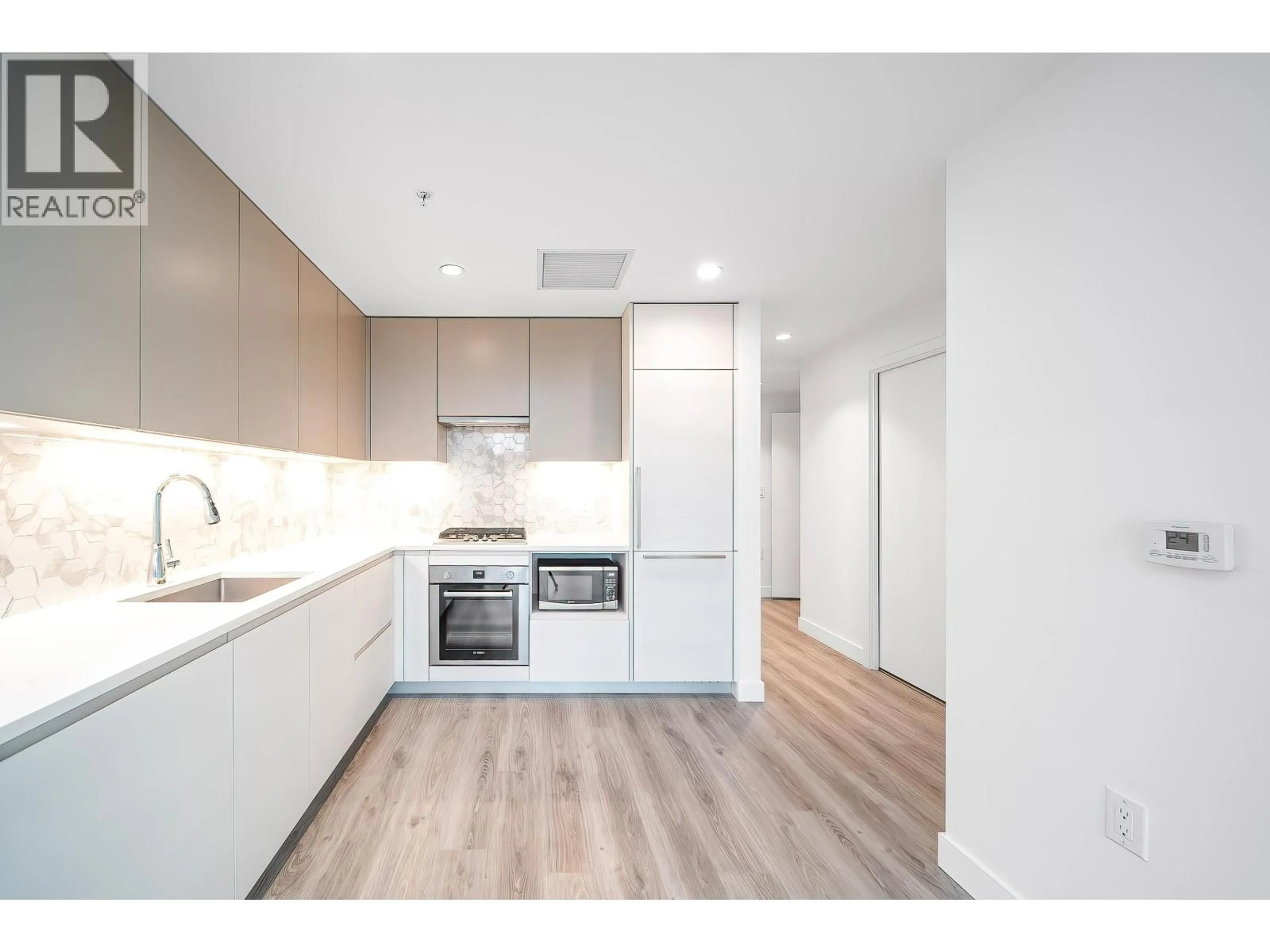 Standard kitchen, wood/laminate floor for 602 - 8181 CHESTER STREET, Vancouver British Columbia V5X0J9
