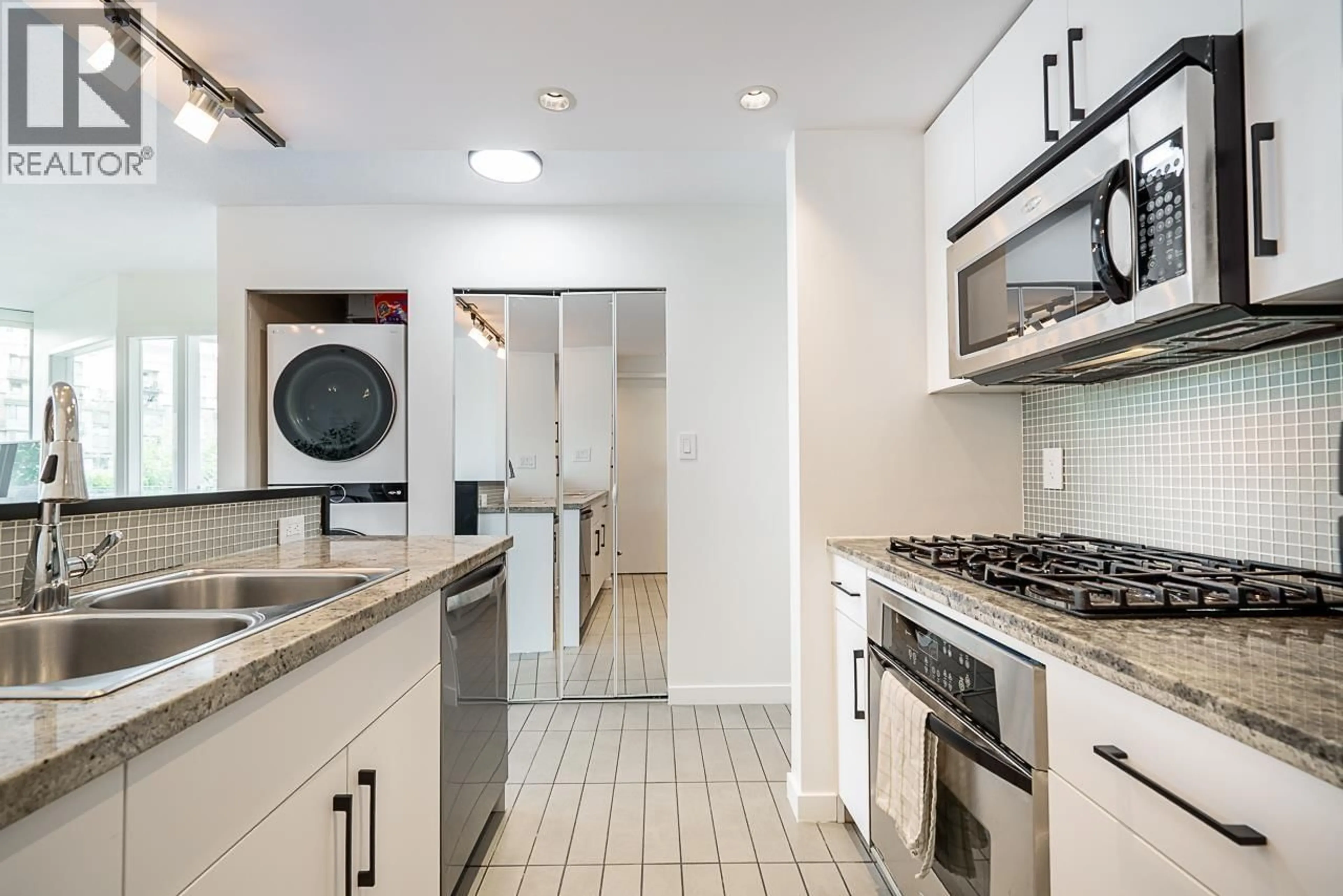 Standard kitchen, ceramic/tile floor for 603 - 980 COOPERAGE WAY, Vancouver British Columbia V6B0C3