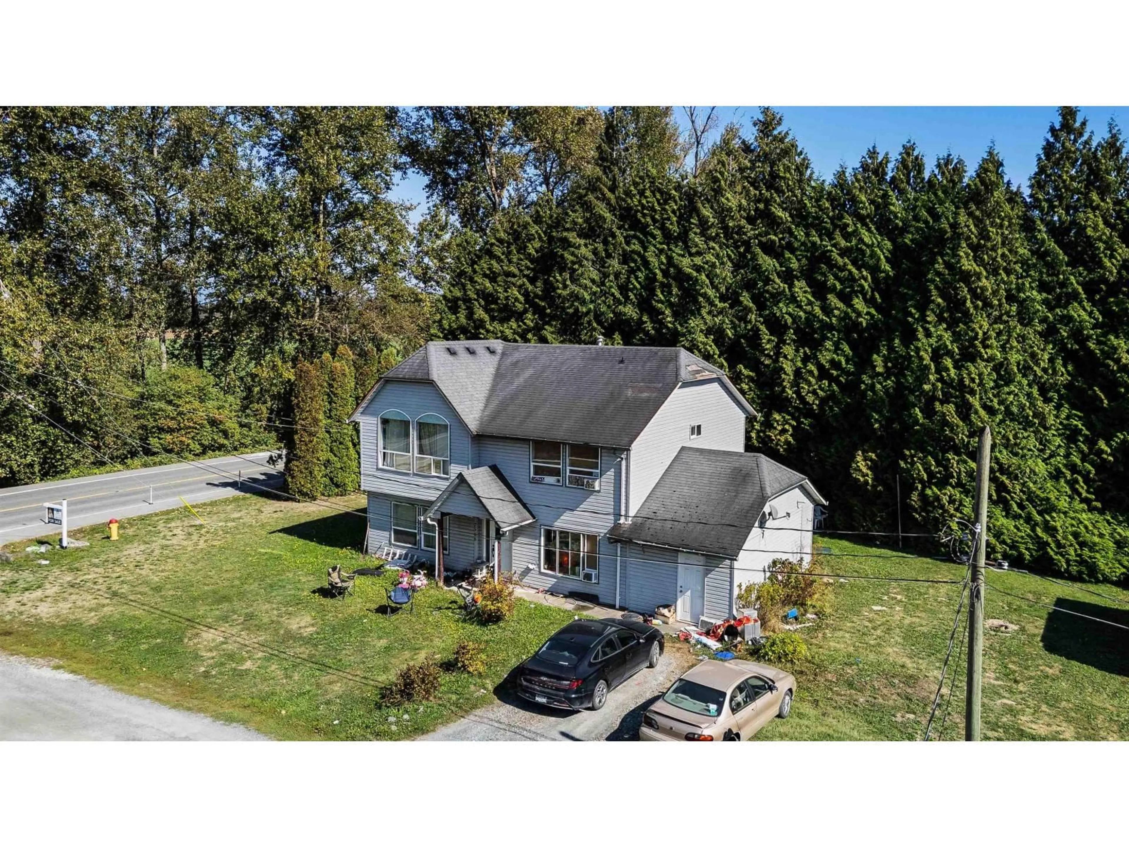A pic from outside/outdoor area/front of a property/back of a property/a pic from drone, street for 7566 CHILLIWACK RIVER ROAD, Chilliwack British Columbia V2R4L9