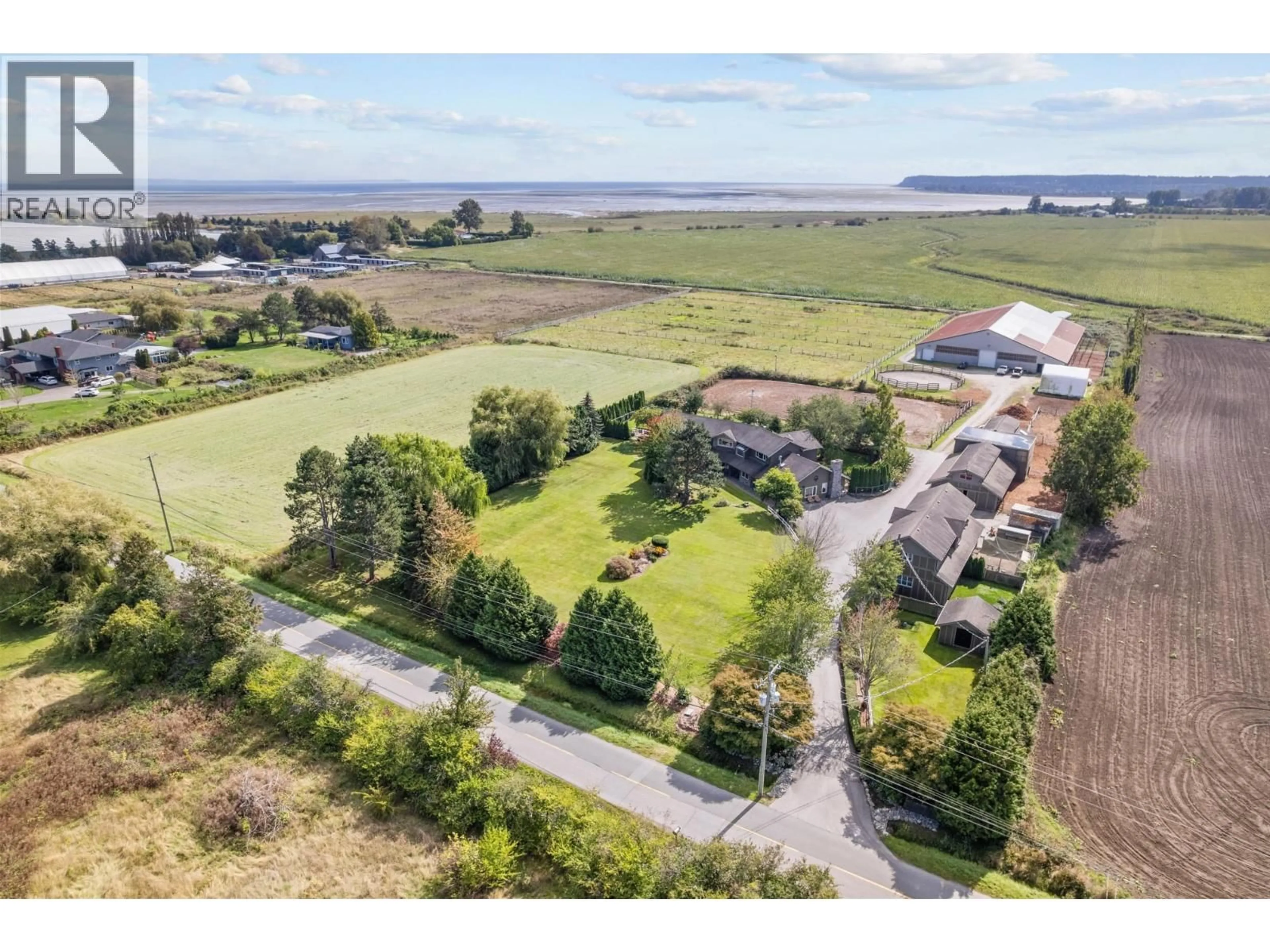 A pic from outside/outdoor area/front of a property/back of a property/a pic from drone, water/lake/river/ocean view for 6200 28 AVENUE, Delta British Columbia V4L2N6