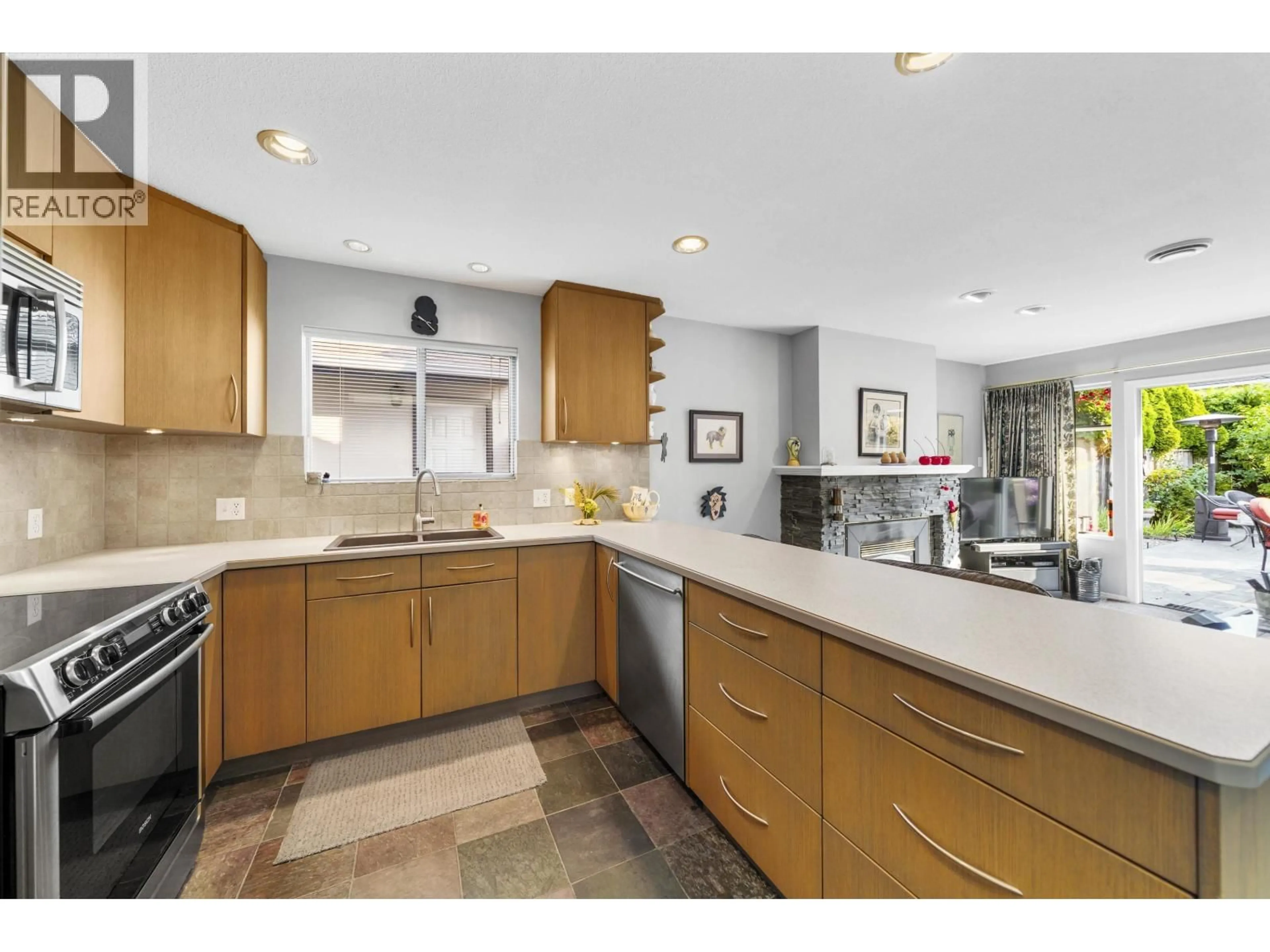 Open concept kitchen, ceramic/tile floor for 4494 DAWN PLACE, Delta British Columbia V4K4S1