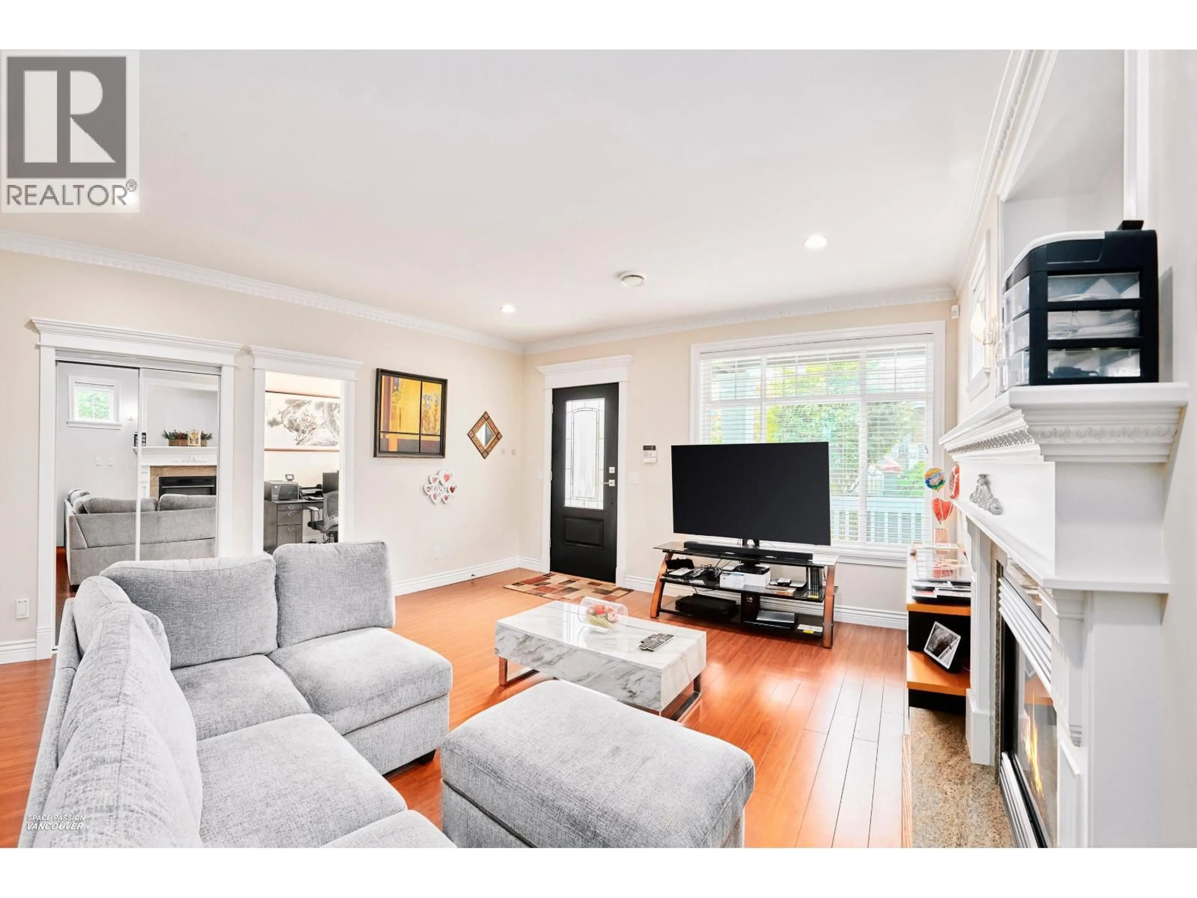 Living room with furniture, wood/laminate floor for 3937 ELMWOOD STREET, Burnaby British Columbia V5G1R9
