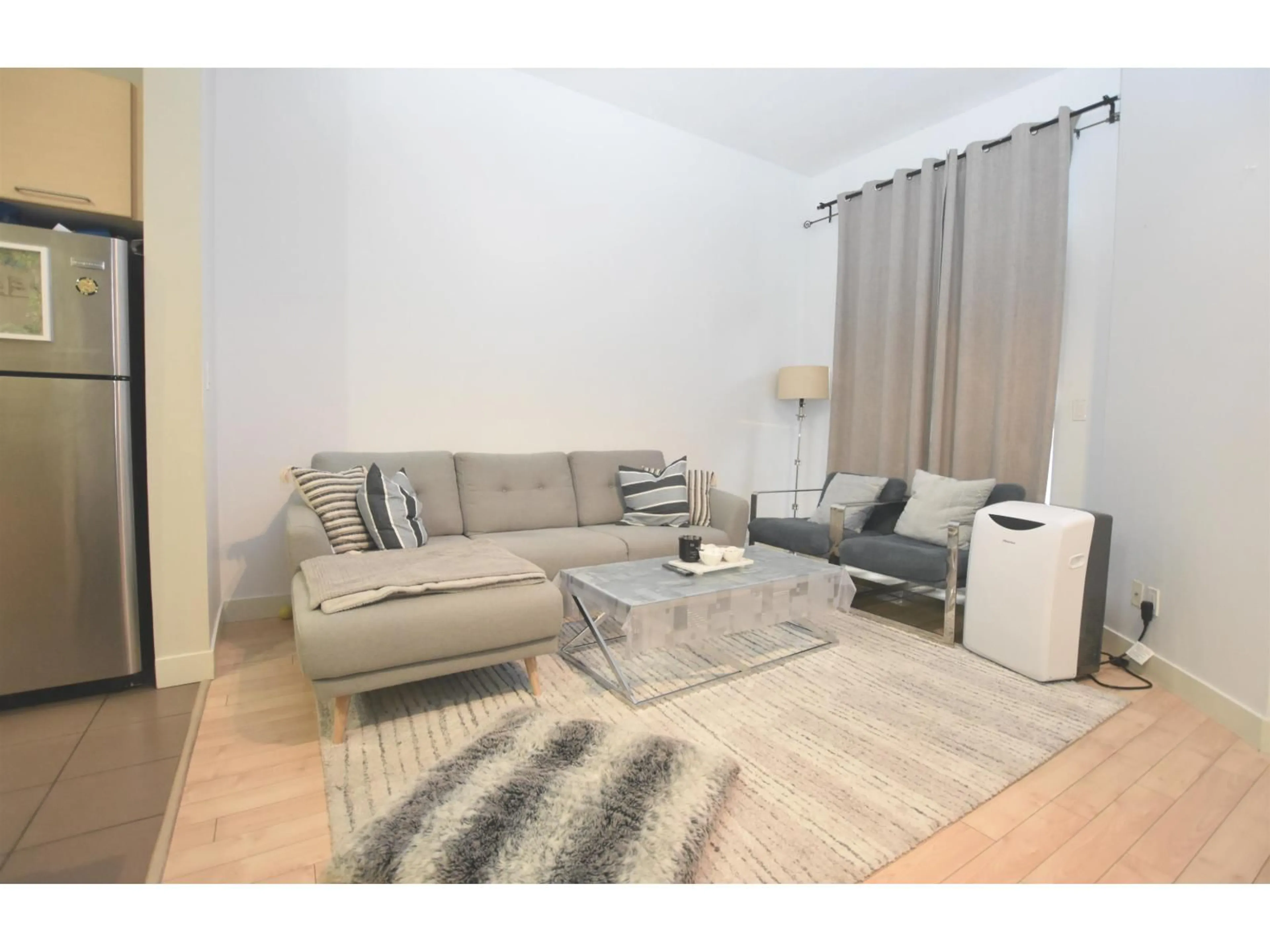 Living room with furniture, unknown for 401 - 10822 CITY, Surrey British Columbia V3T5X9