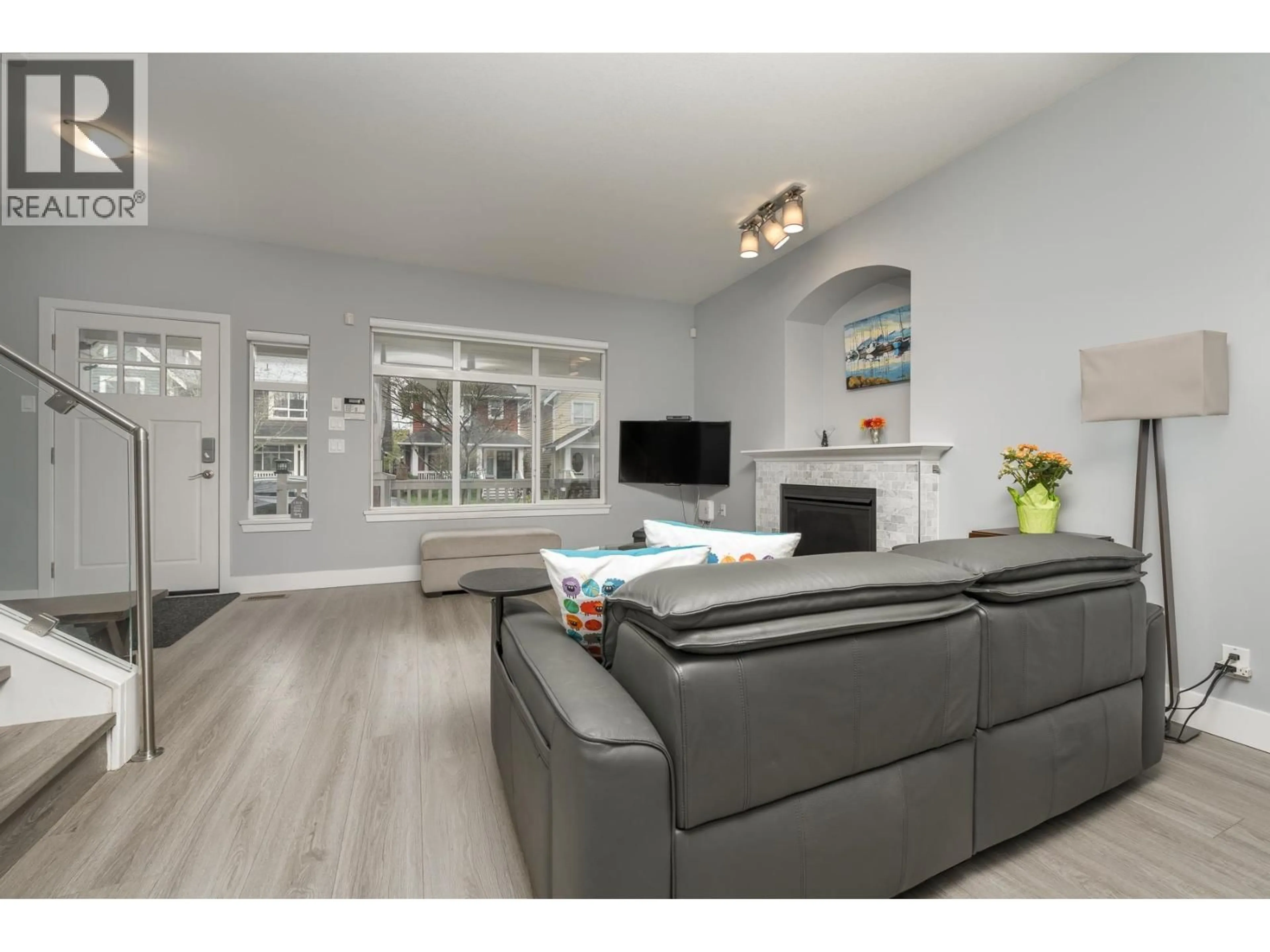 Living room with furniture, wood/laminate floor for 155 DOCKSIDE COURT, New Westminster British Columbia V3M0B2