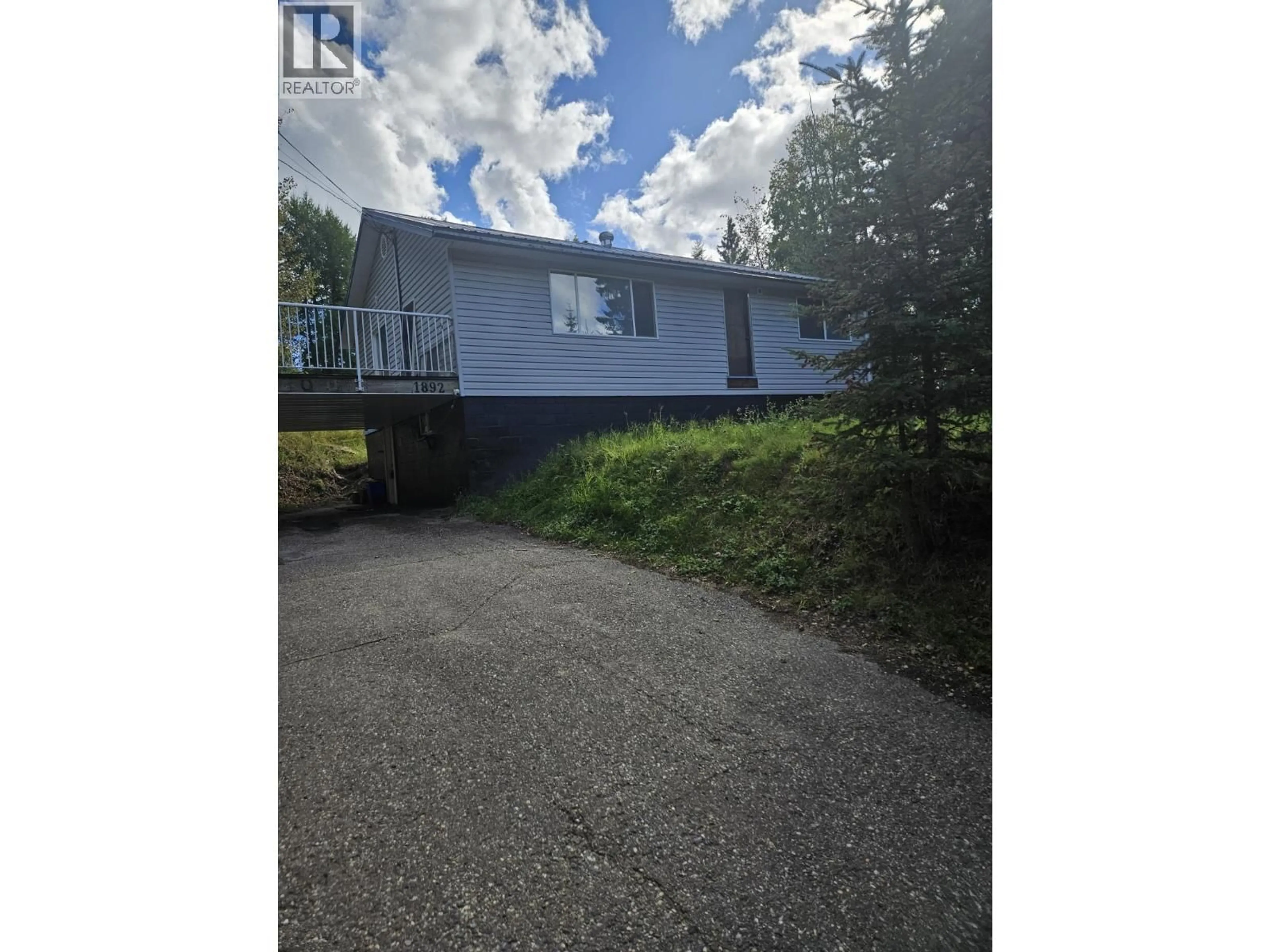 A pic from outside/outdoor area/front of a property/back of a property/a pic from drone, unknown for 1892 DUBOIS DRIVE, Prince George British Columbia V2K1M1