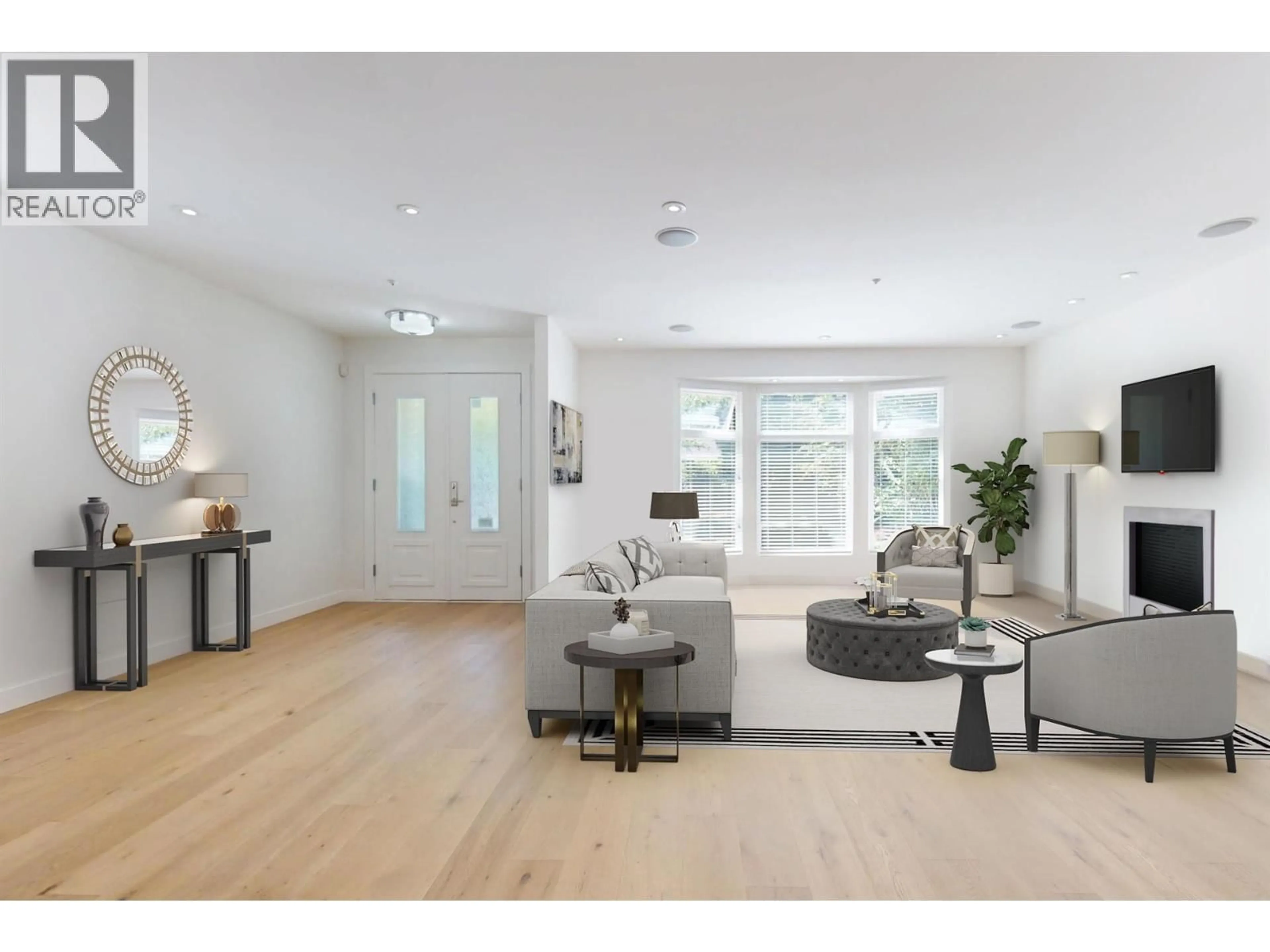 Living room with furniture, wood/laminate floor for 4447 15TH AVENUE, Vancouver British Columbia V6R3B1