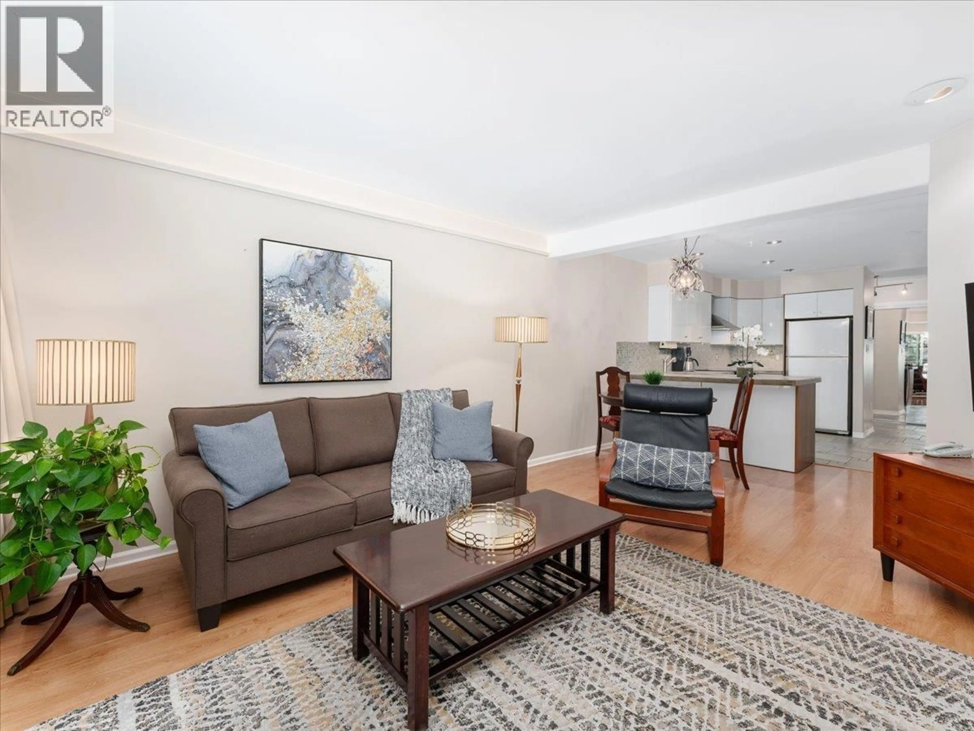 Living room with furniture, wood/laminate floor for 304 - 1274 BARCLAY STREET, Vancouver British Columbia V6E1H3