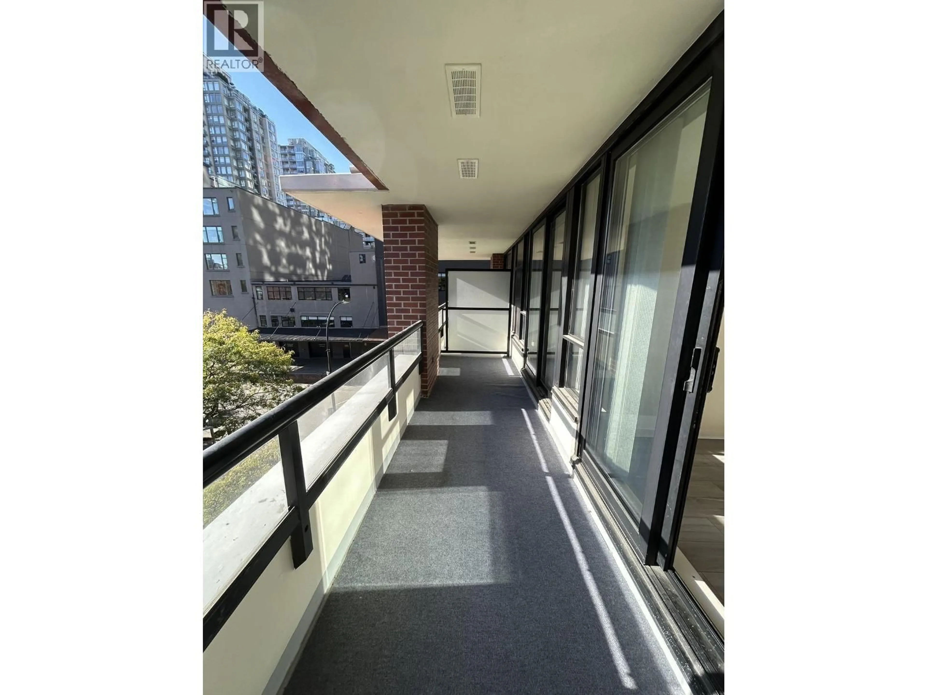 Balcony in the apartment, city buildings view from balcony for 410 - 977 MAINLAND STREET, Vancouver British Columbia V6B1T2