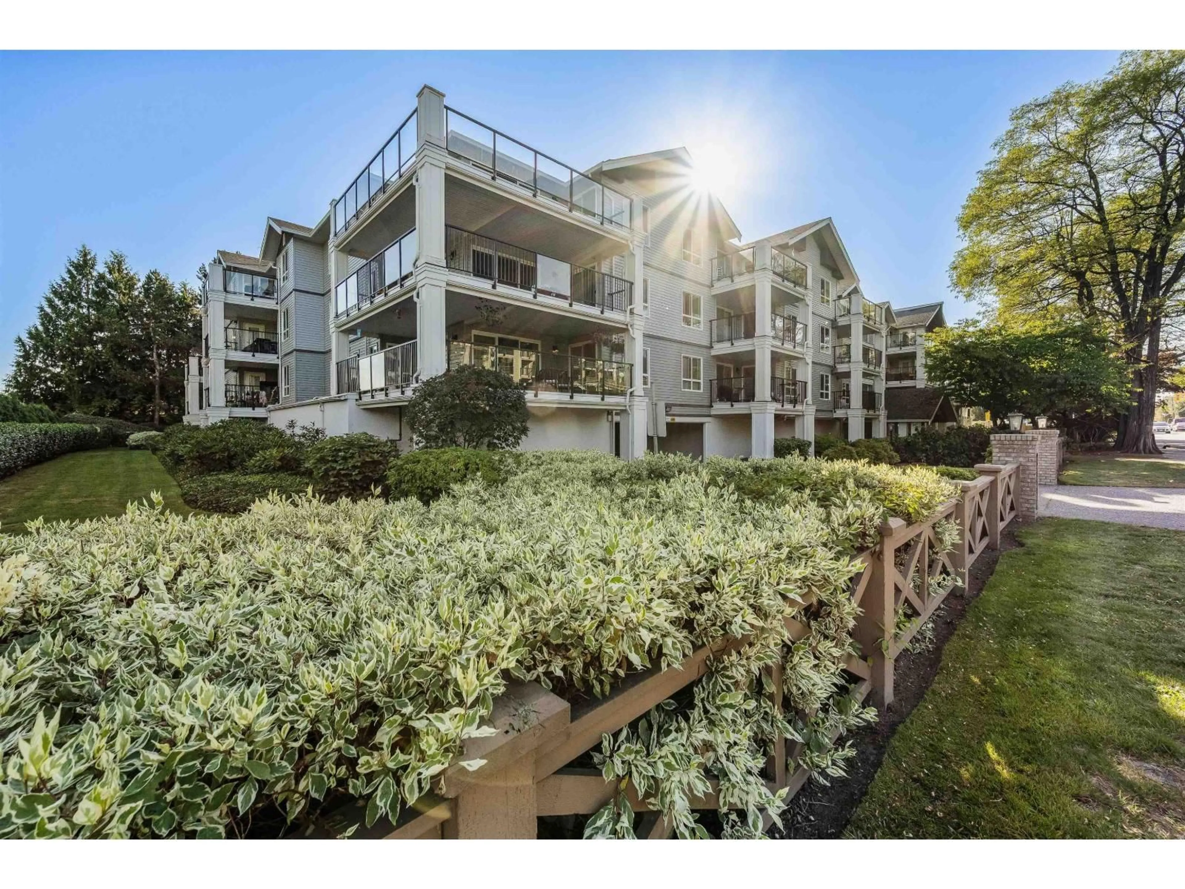 A pic from outside/outdoor area/front of a property/back of a property/a pic from drone, unknown for 210 - 20976 56, Langley British Columbia V3A7Z2