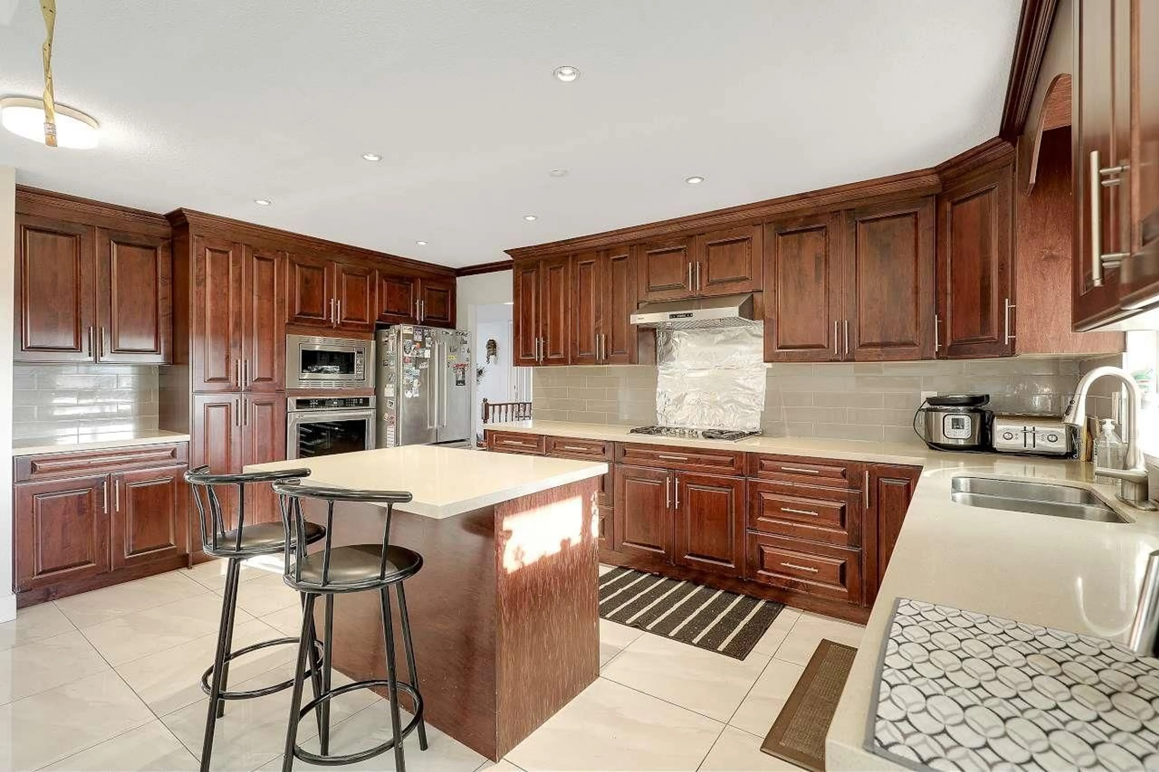 Open concept kitchen, ceramic/tile floor for 8825 185, Surrey British Columbia V4N3T2