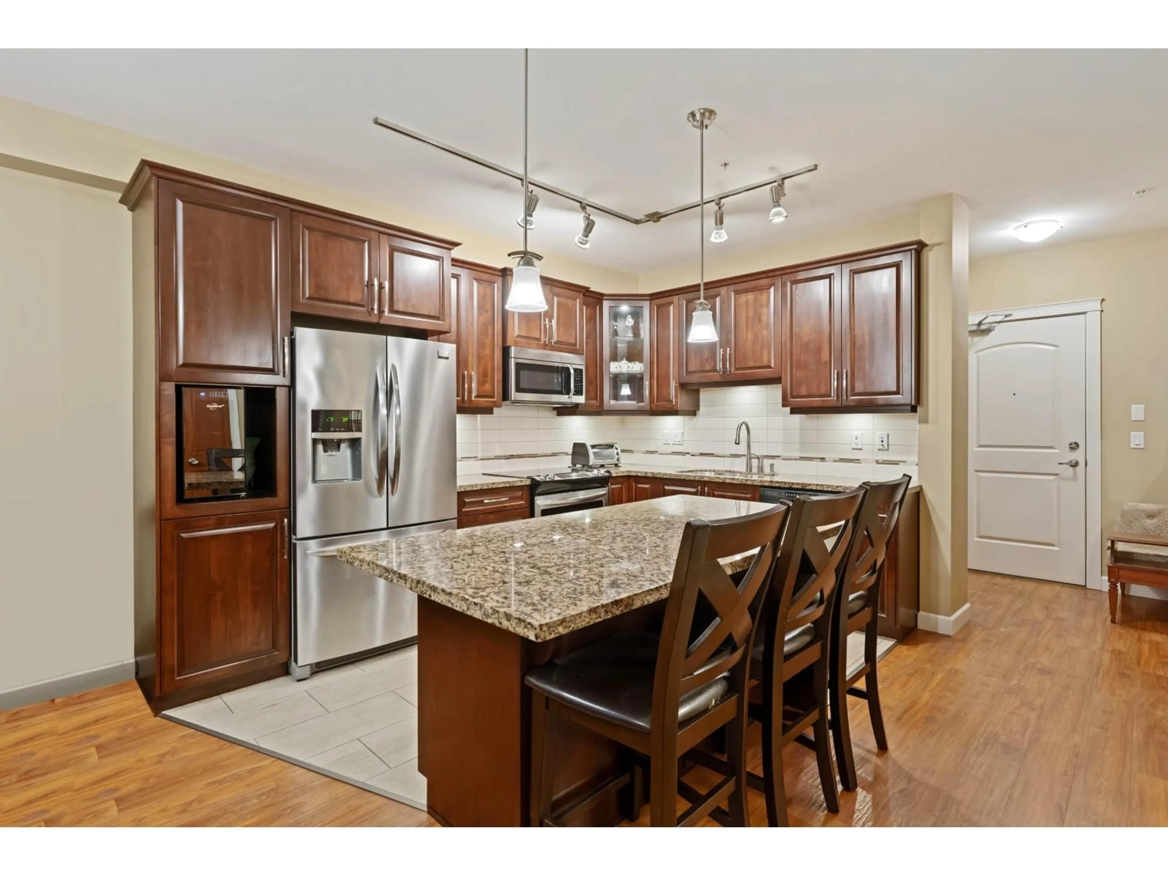 Open concept kitchen, unknown for 104 - 8258 207A, Langley British Columbia V2Y0N3