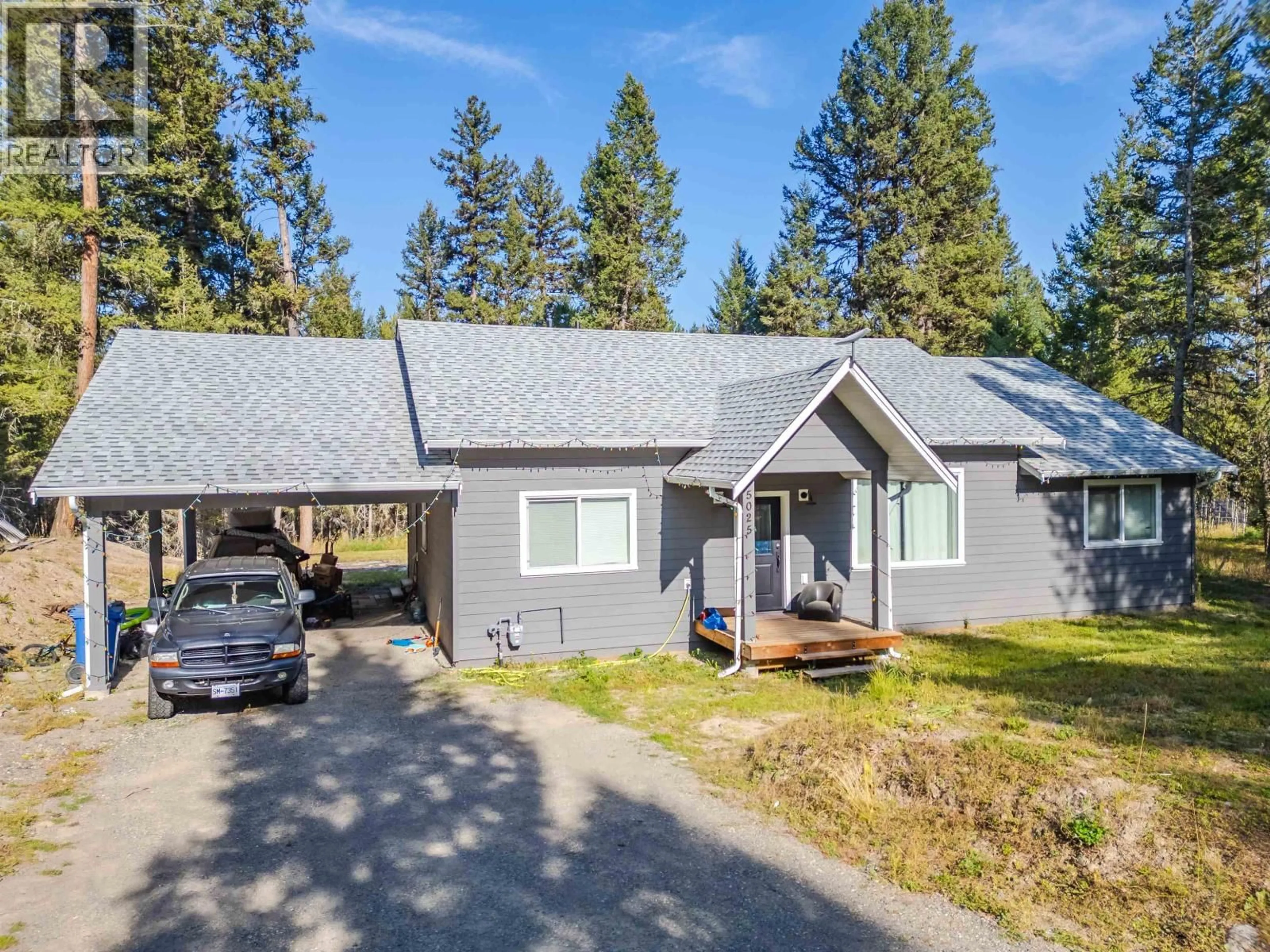 Home with vinyl exterior material, street for 5025 KYLLO ROAD, 108 Mile Ranch British Columbia V0K2Z0
