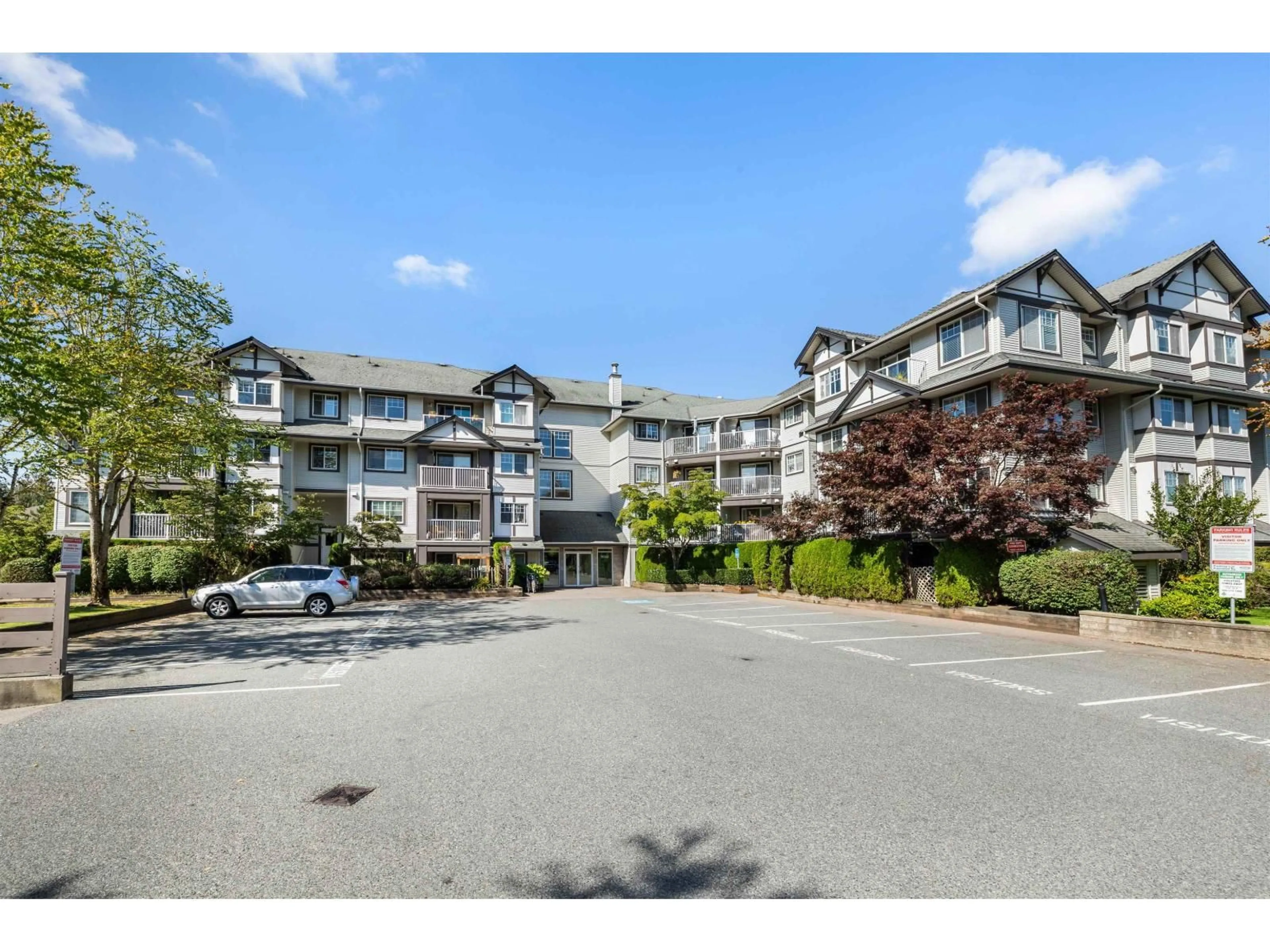 A pic from outside/outdoor area/front of a property/back of a property/a pic from drone, unknown for 309 - 19320 65, Surrey British Columbia V4N0A3