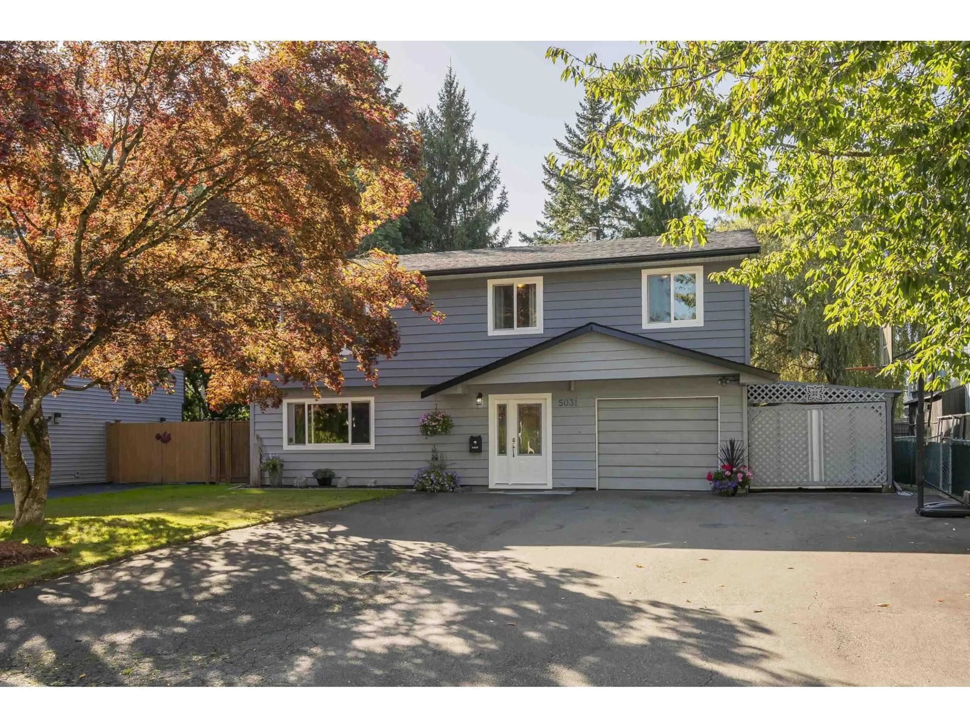 Home with vinyl exterior material, street for 5031 205, Langley British Columbia V3A5P8