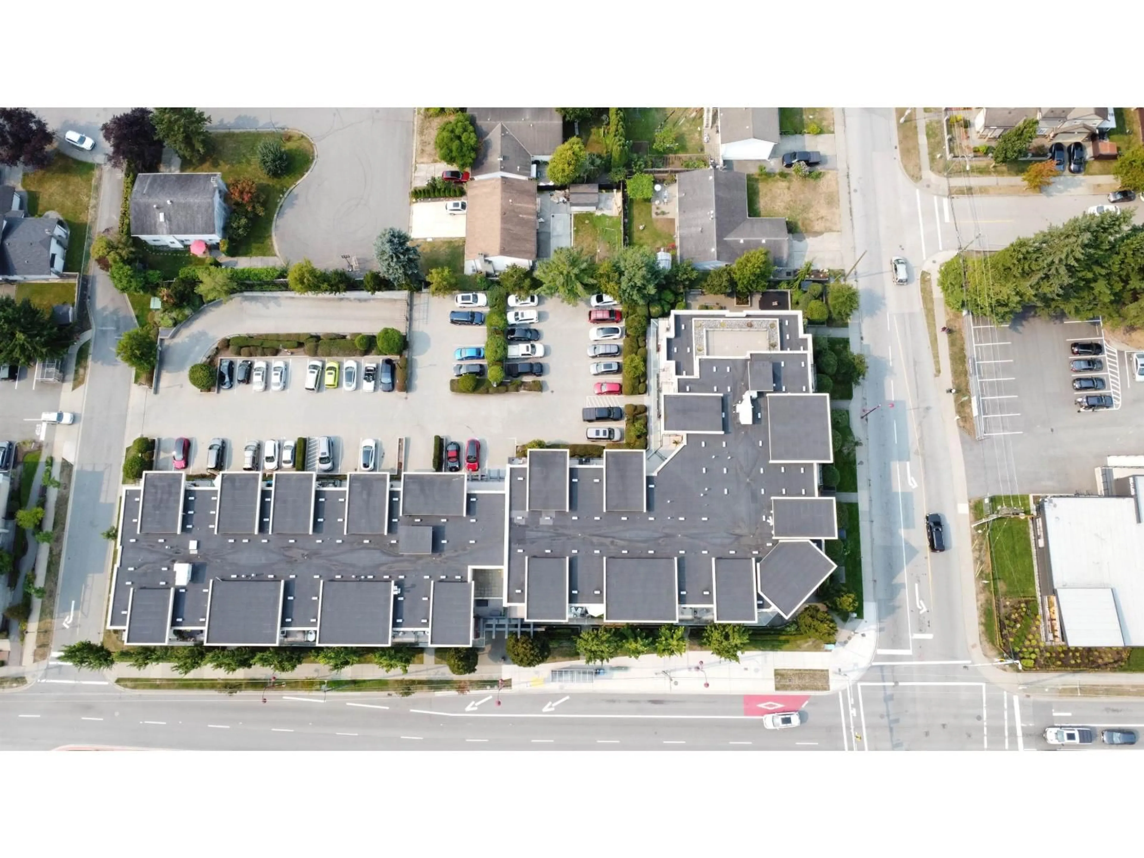 A pic from outside/outdoor area/front of a property/back of a property/a pic from drone, street for 212 - 7511 120, Delta British Columbia V4C0C1