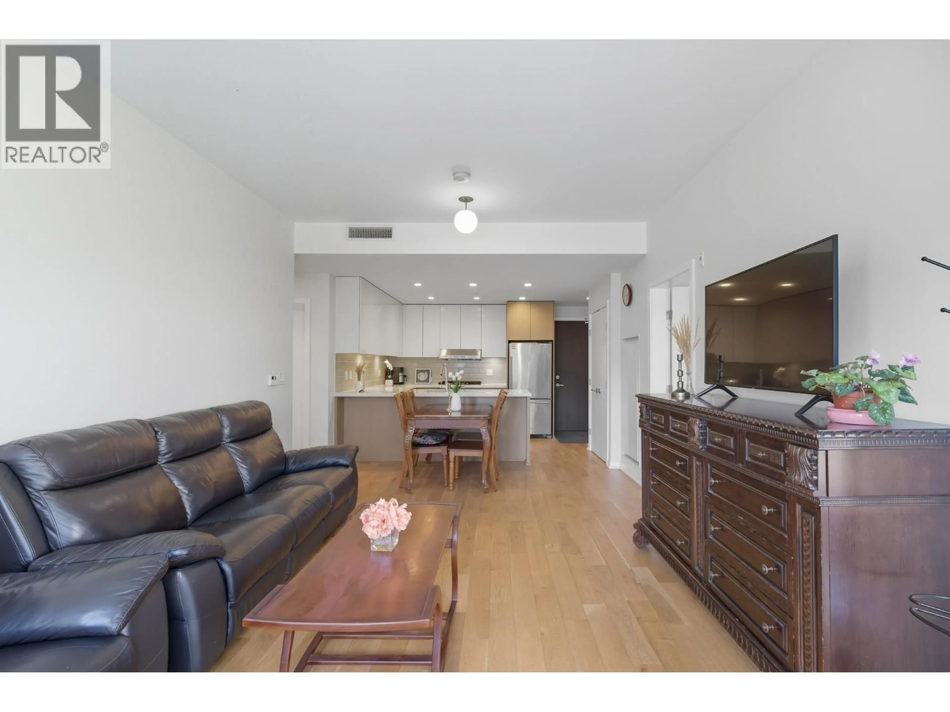 Living room with furniture, wood/laminate floor for 332 - 7008 RIVER PARKWAY, Richmond British Columbia V6X0R1