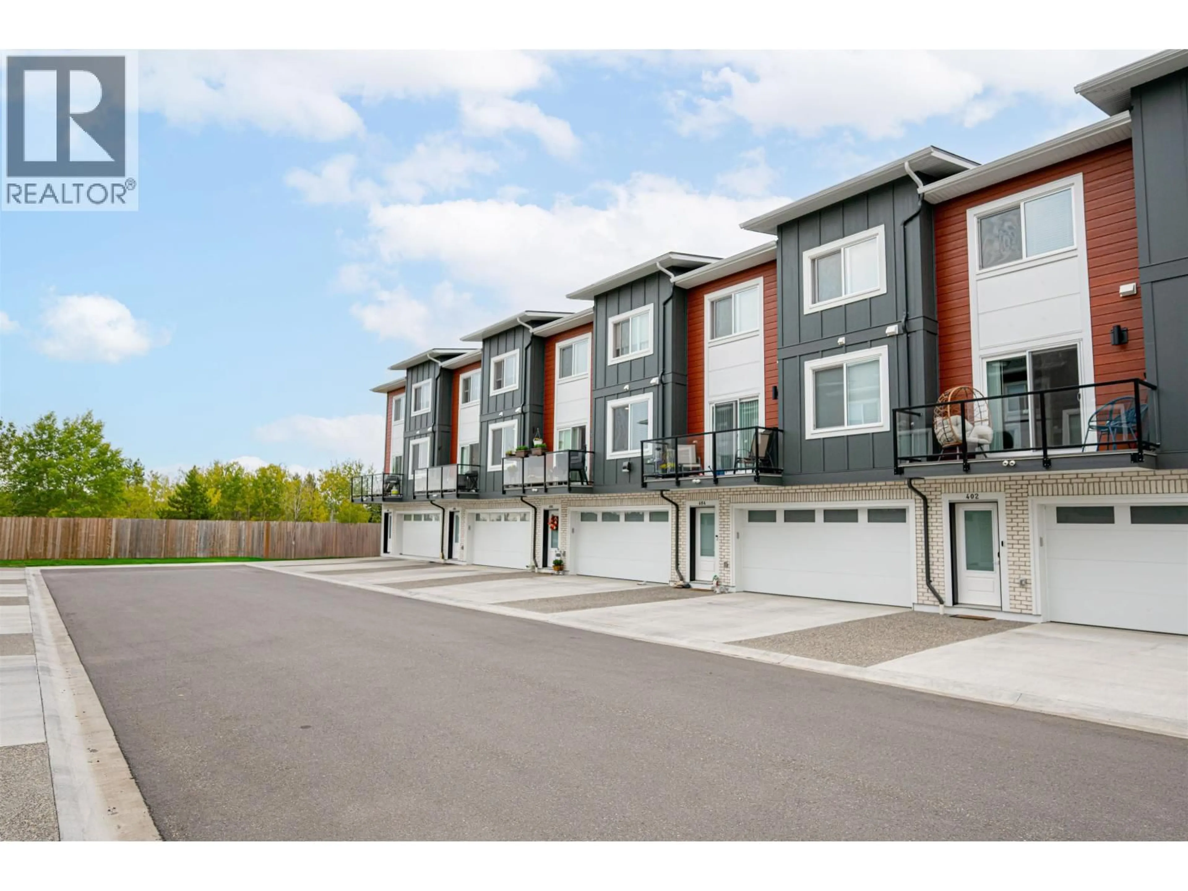 A pic from outside/outdoor area/front of a property/back of a property/a pic from drone, street for 408 - 4274 22ND AVENUE, Prince George British Columbia V2N0J4