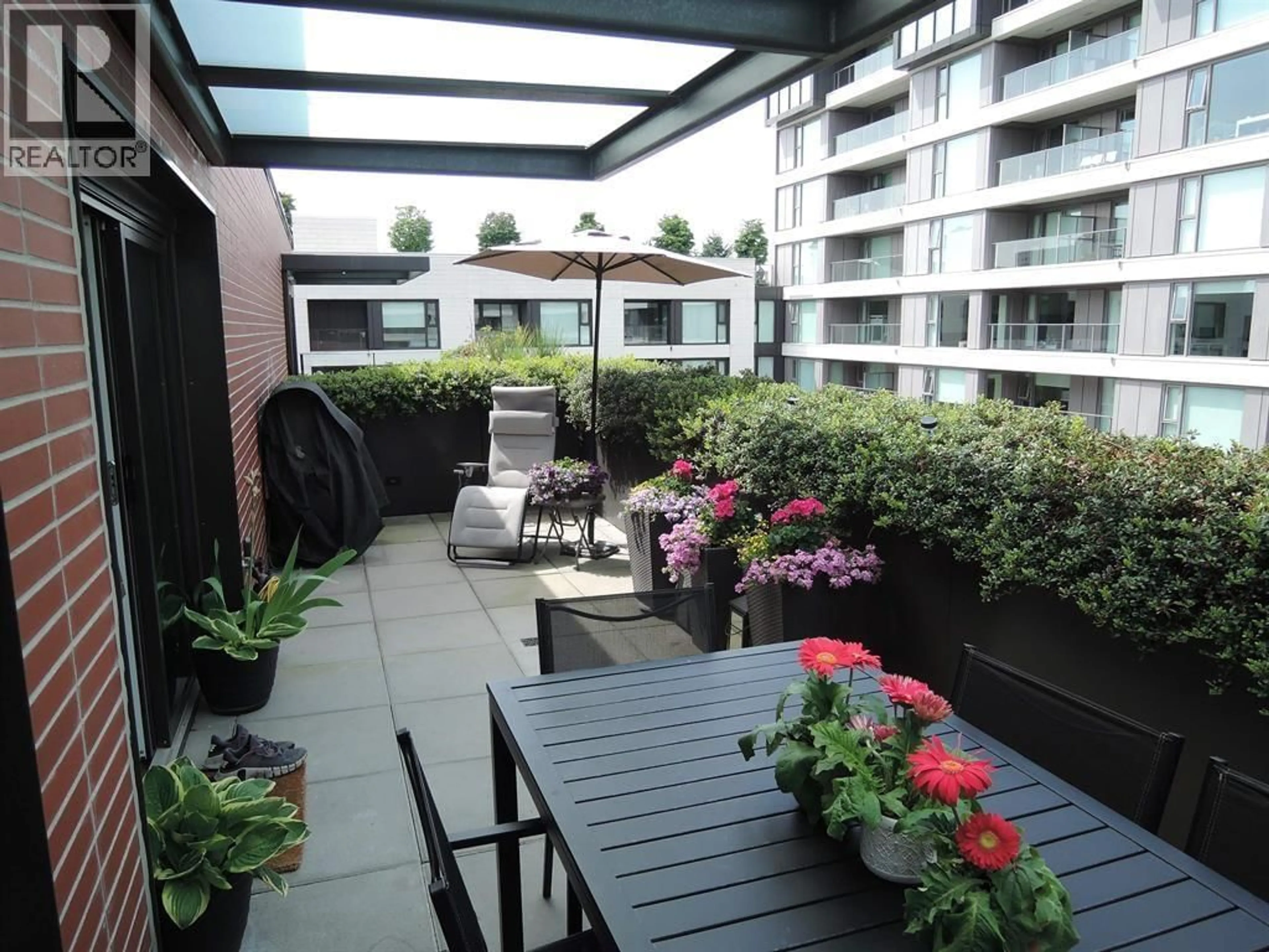 Patio, city buildings view from balcony for 704 - 1571 57TH AVENUE, Vancouver British Columbia V6P0H7
