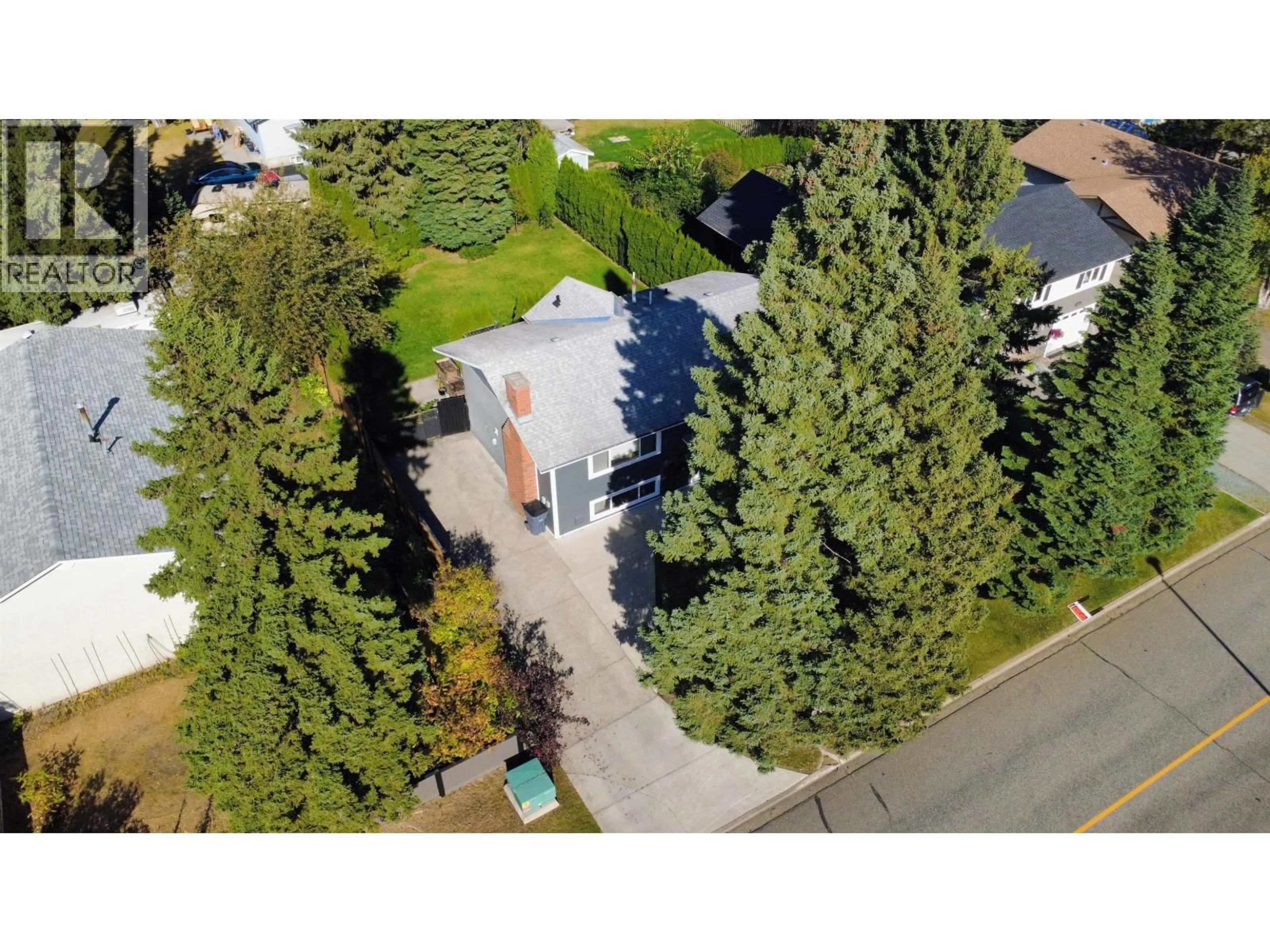 A pic from outside/outdoor area/front of a property/back of a property/a pic from drone, street for 4150 RAINBOW DRIVE, Prince George British Columbia V2K4X8