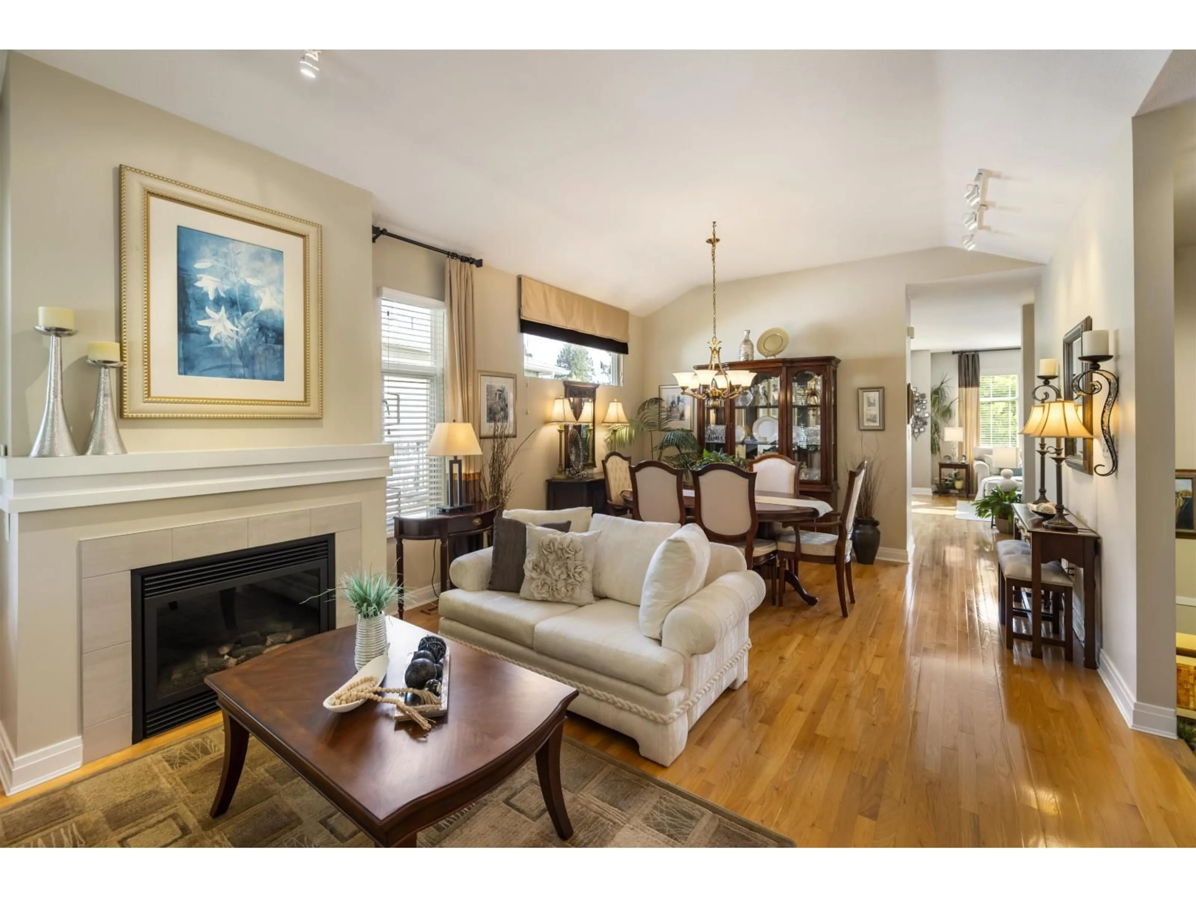 Living room with furniture, wood/laminate floor for 25 - 15188 62A, Surrey British Columbia V3S1W7