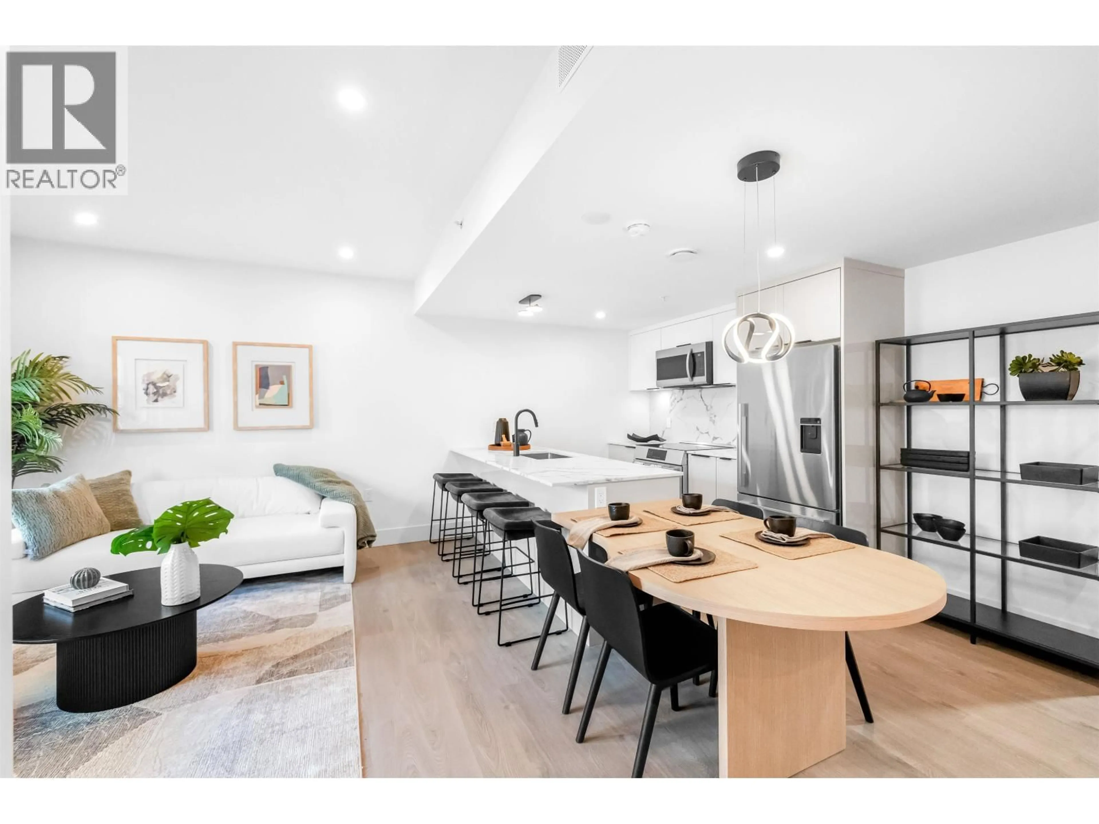 Open concept kitchen, wood/laminate floor for 1685 LAKEWOOD DRIVE, Vancouver British Columbia V5N1B6