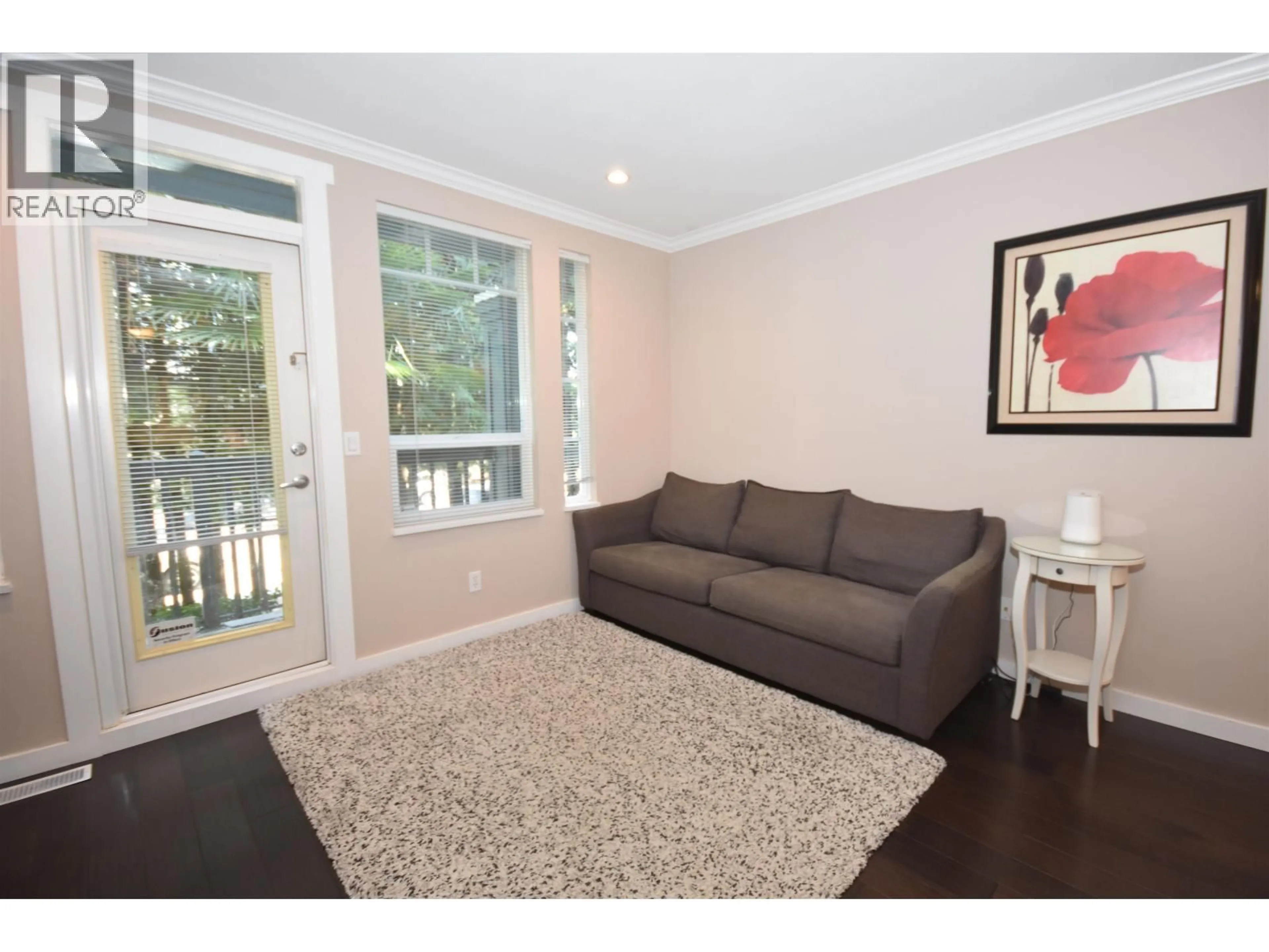 Living room with furniture, wood/laminate floor for 6 - 4787 57 STREET, Delta British Columbia V4K4C7