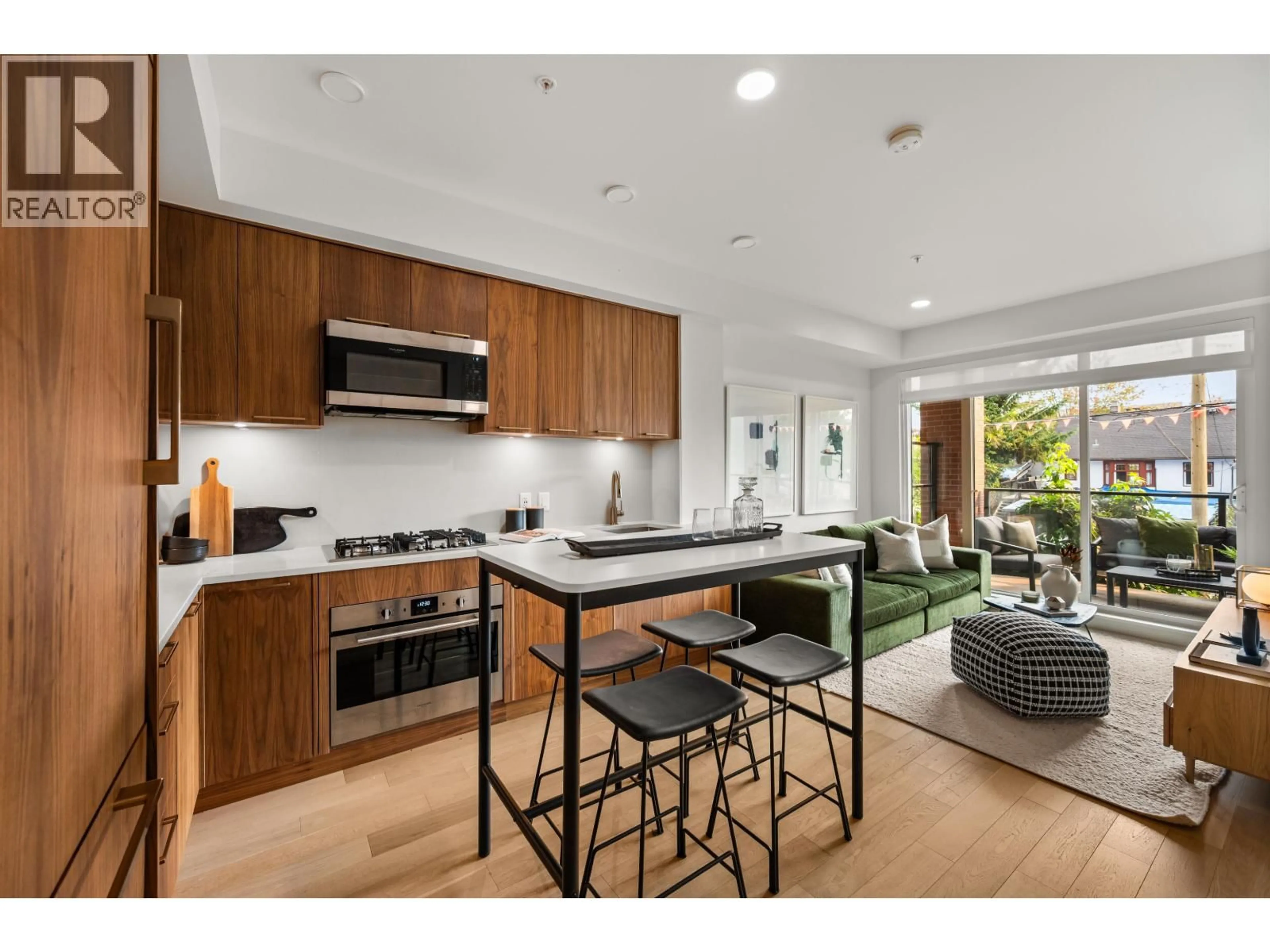 Open concept kitchen, unknown for 202 - 2550 GARDEN DRIVE, Vancouver British Columbia V5N4X6