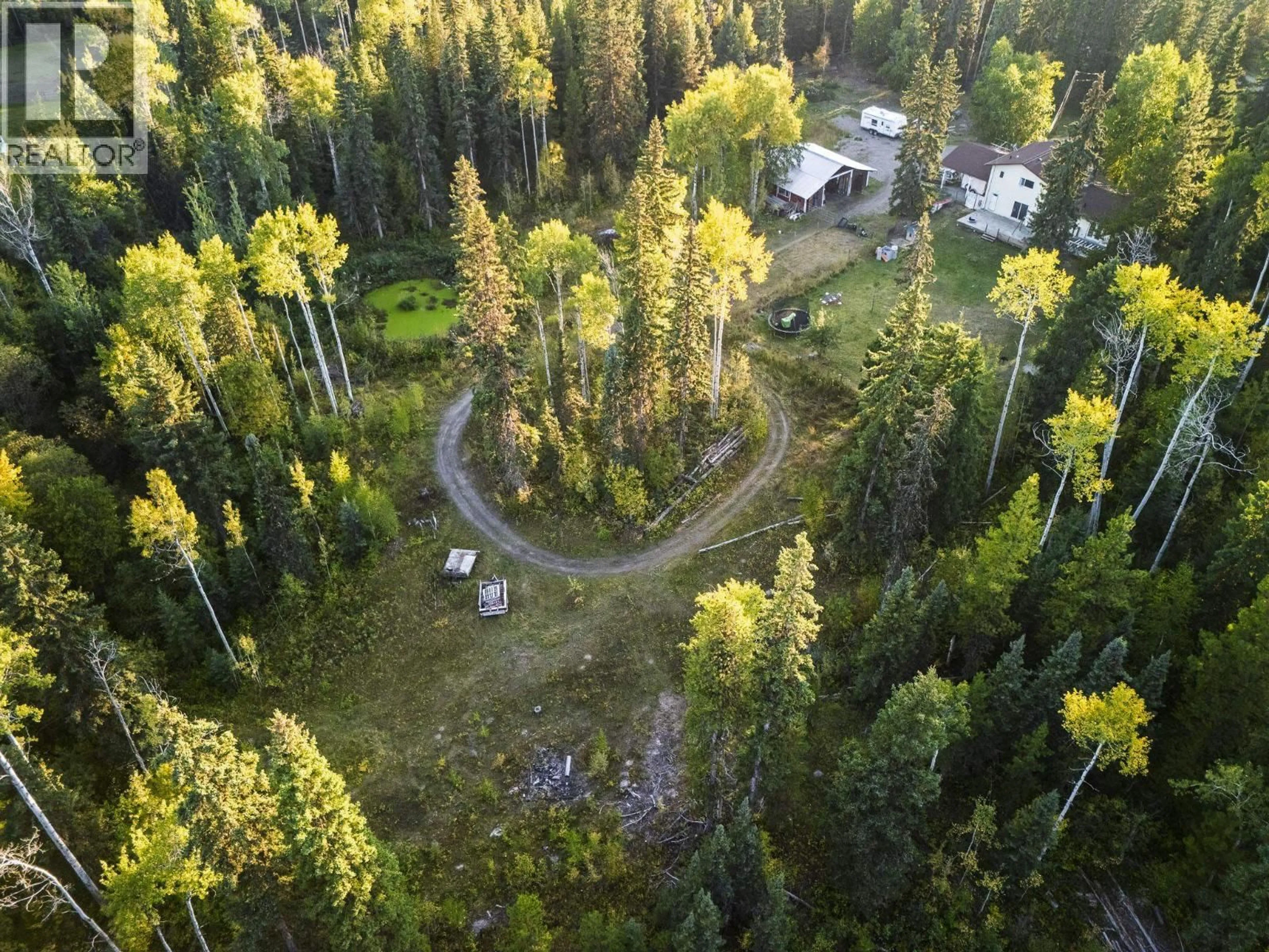 A pic from outside/outdoor area/front of a property/back of a property/a pic from drone, forest/trees view for 9930 SKYLARK ROAD, Prince George British Columbia V2N5B6