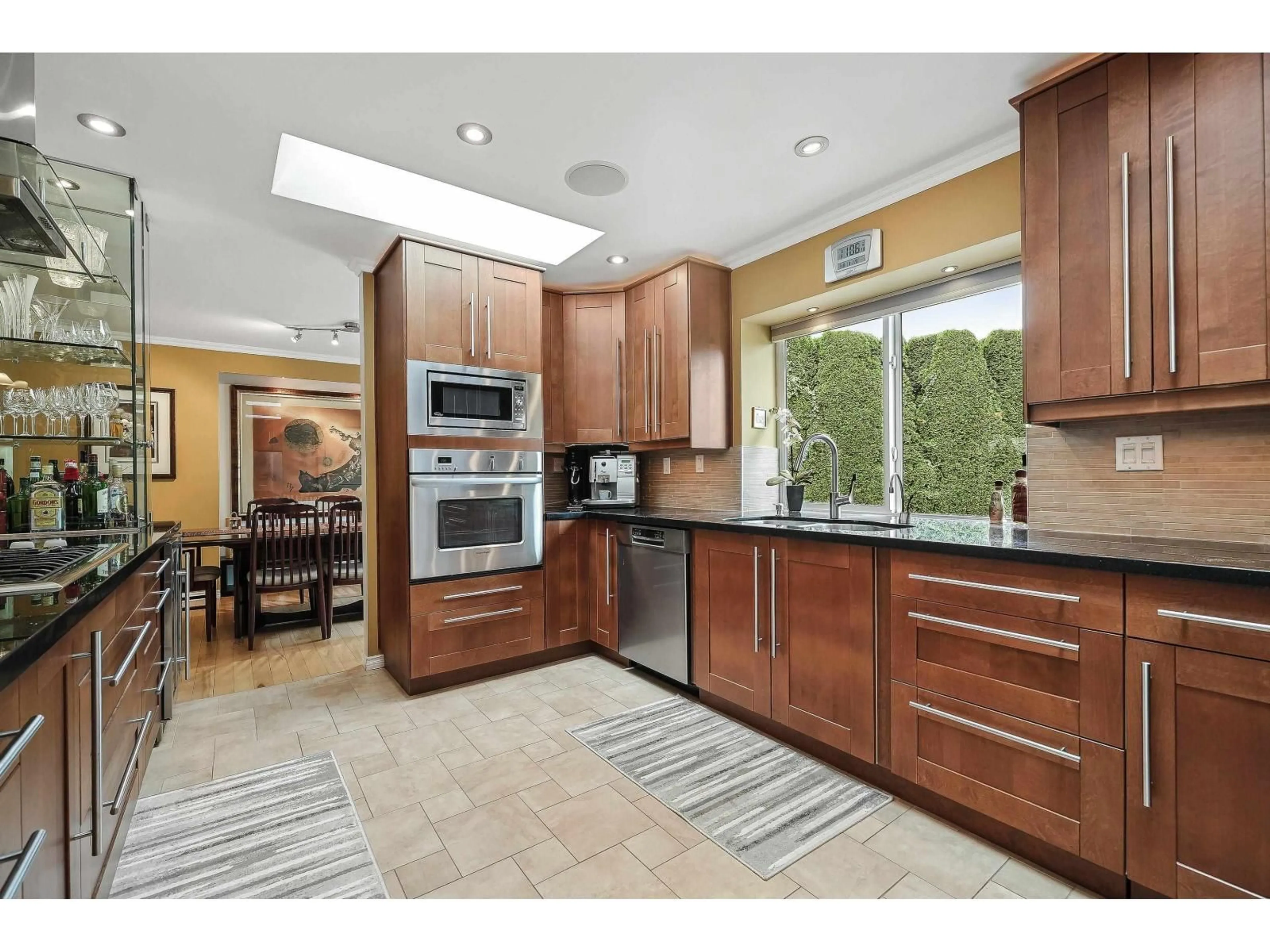 Open concept kitchen, ceramic/tile floor for 9175 MULHOLLAND, Delta British Columbia V4C7X4