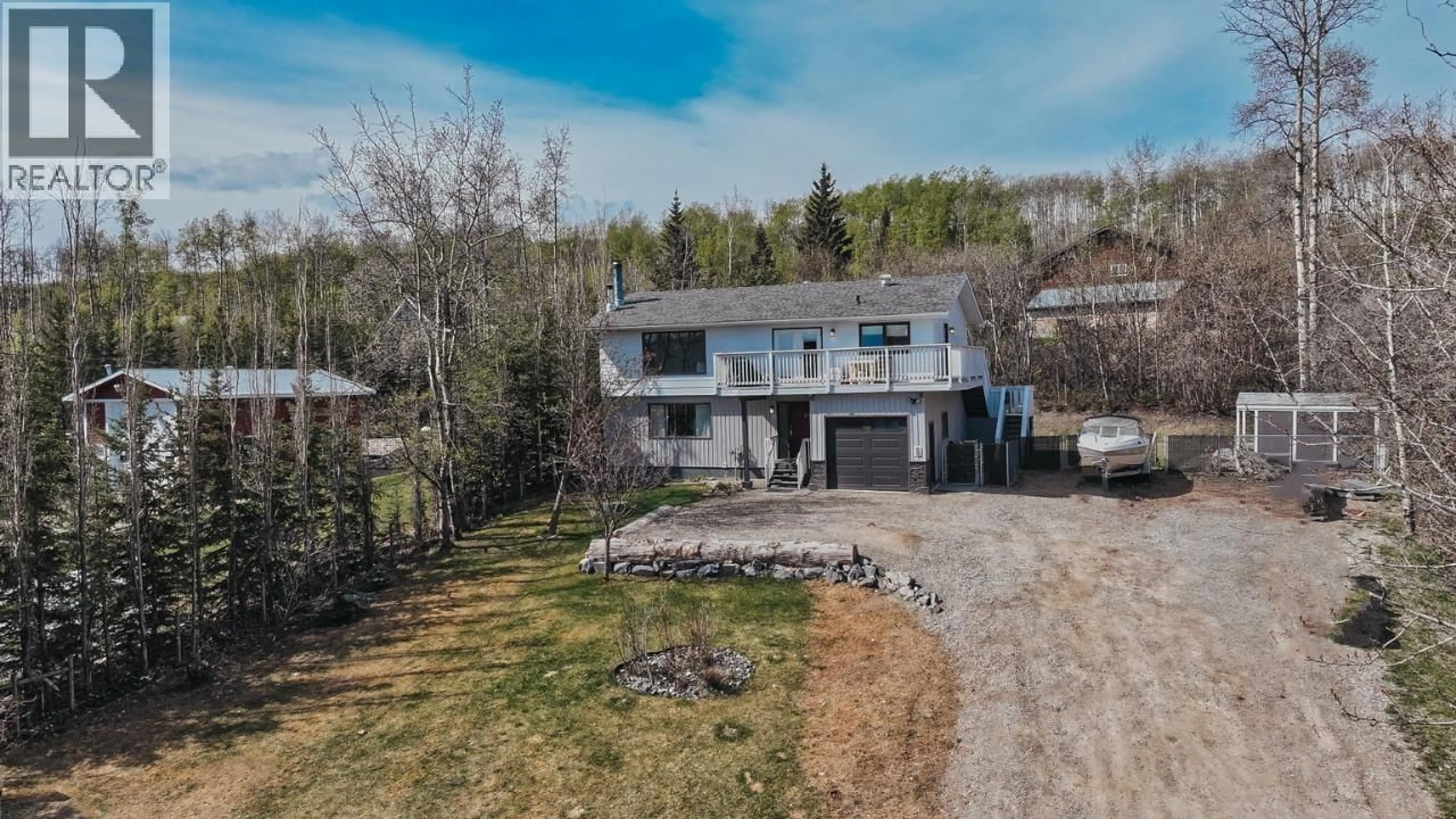 A pic from outside/outdoor area/front of a property/back of a property/a pic from drone, street for 13223 LAKESHORE DRIVE, Fort St. John British Columbia V0C1H0