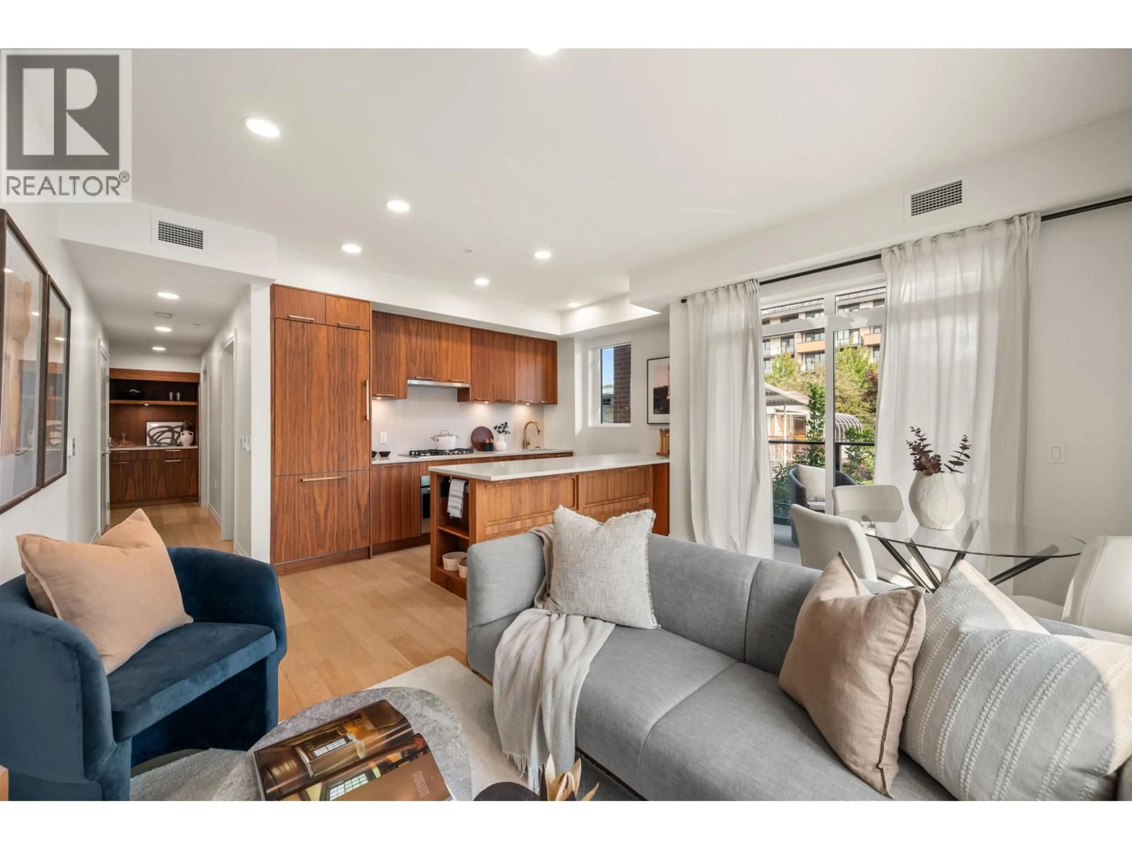 Open concept kitchen, unknown for 213 - 2550 GARDEN DRIVE, Vancouver British Columbia V5N4X6