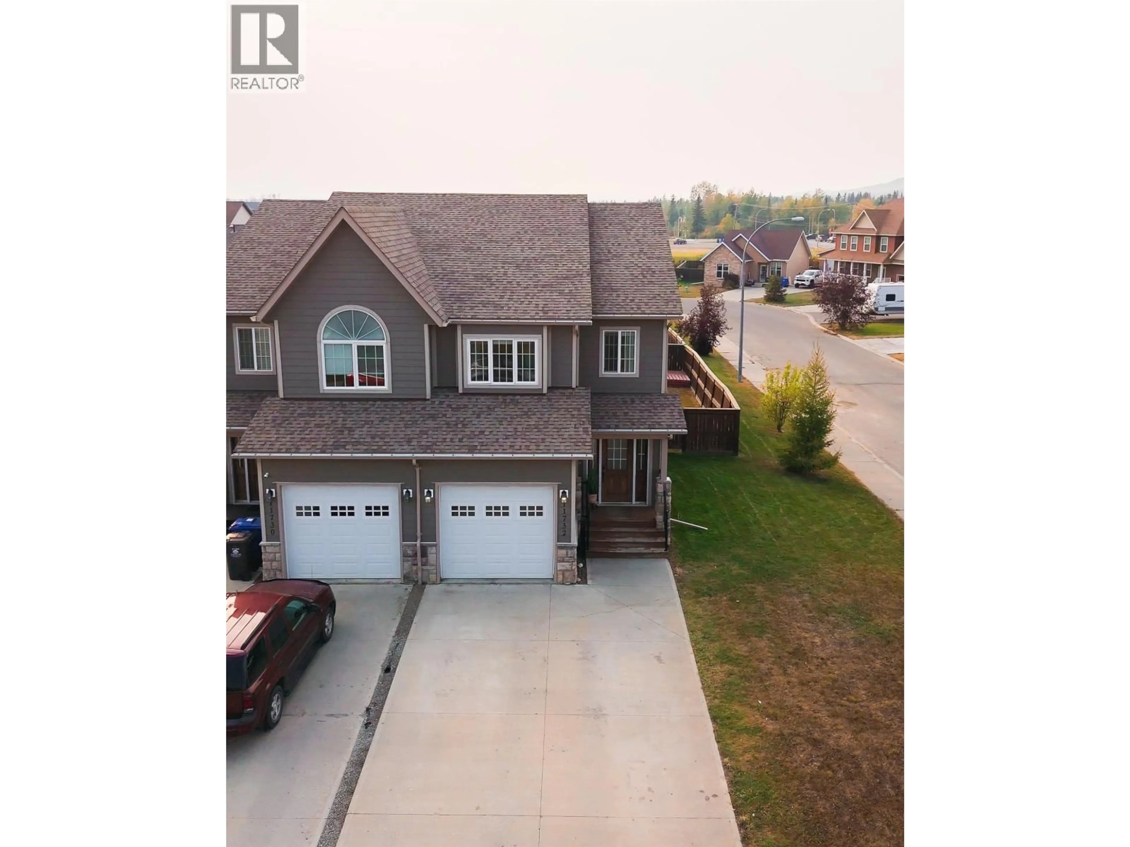 A pic from outside/outdoor area/front of a property/back of a property/a pic from drone, street for 11732 97 STREET, Fort St. John British Columbia V1J0E9