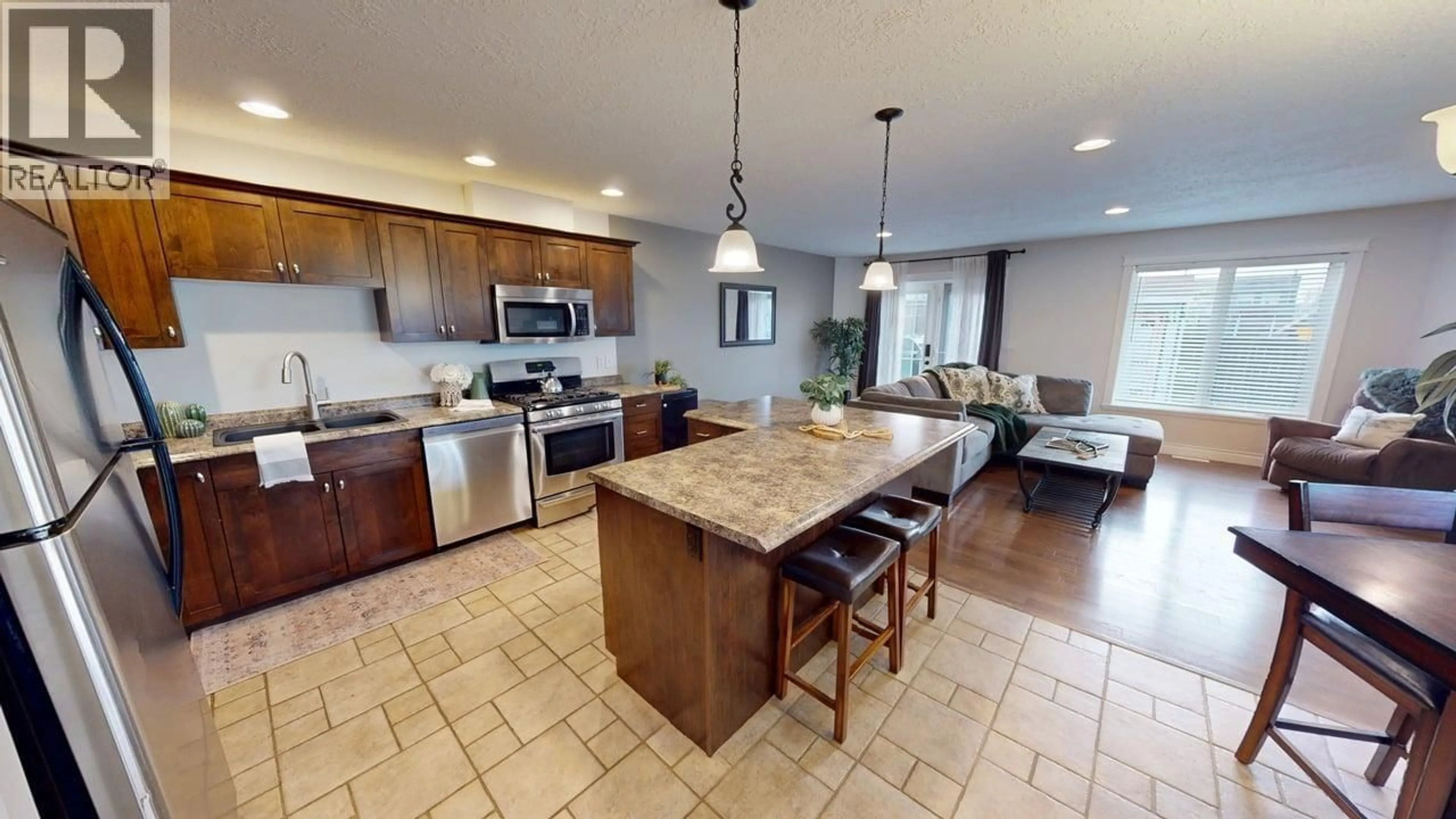 Open concept kitchen, ceramic/tile floor for 11732 97 STREET, Fort St. John British Columbia V1J0E9