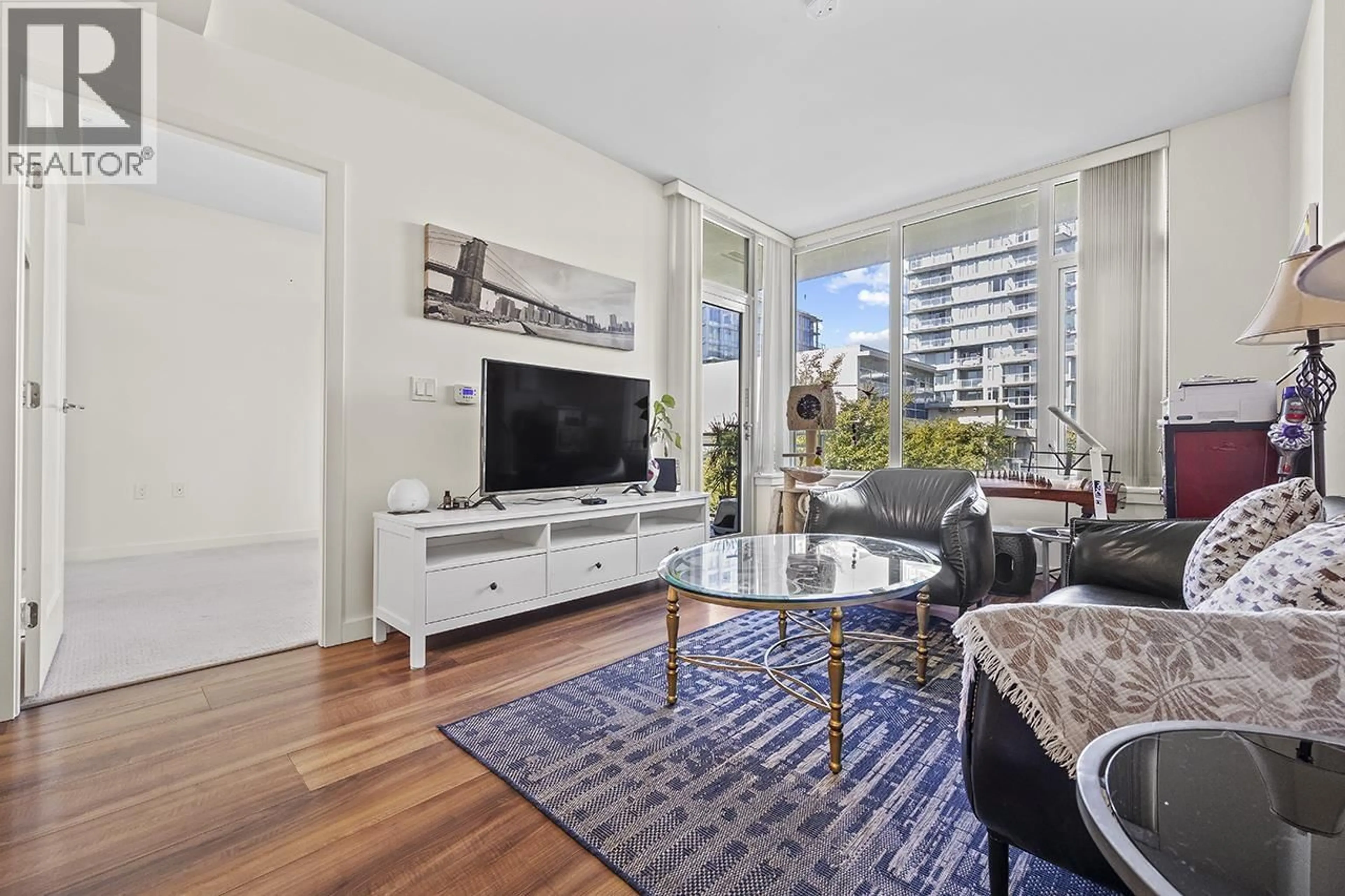 Living room with furniture, unknown for 617 - 8677 CAPSTAN WAY, Richmond British Columbia V6X0N6