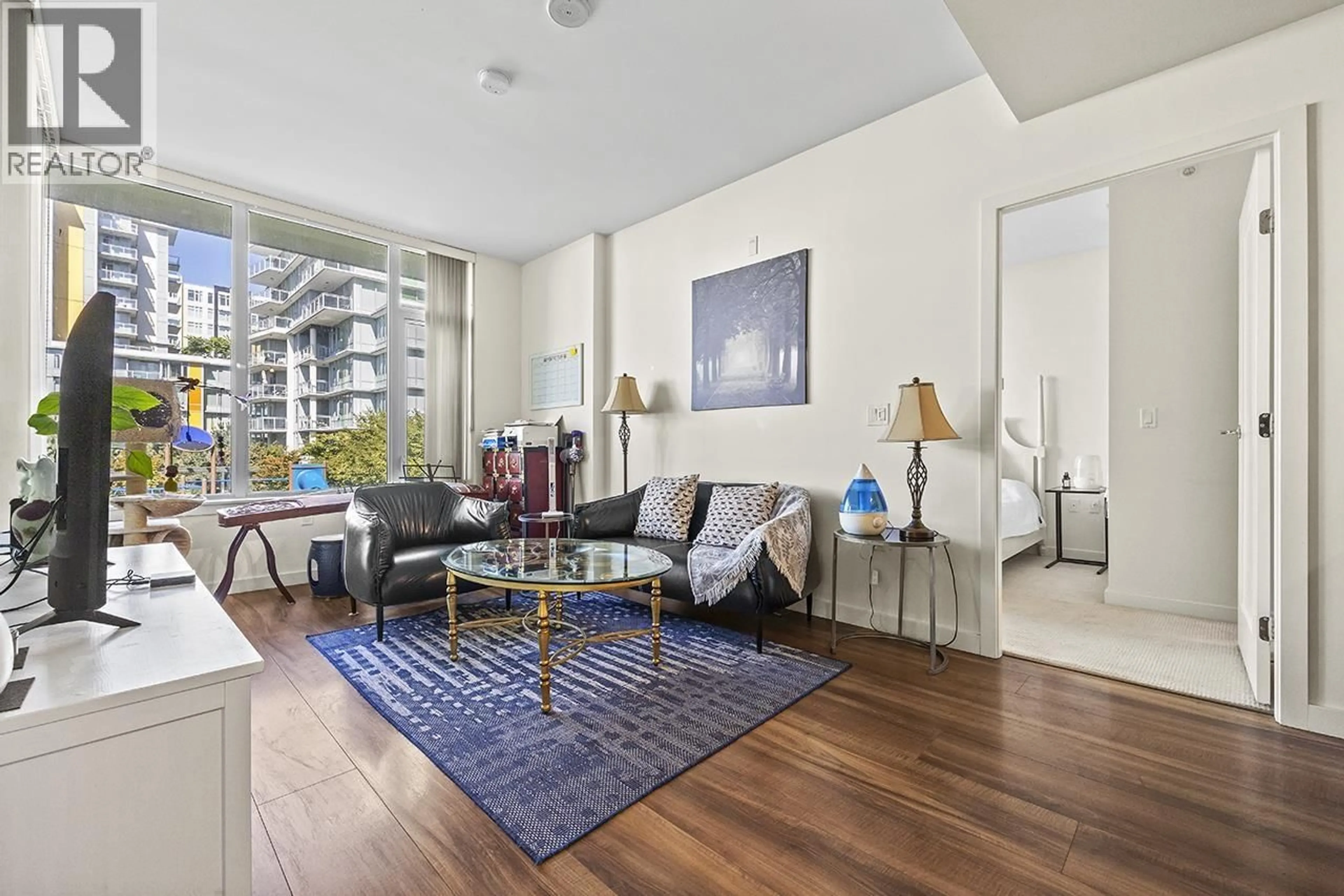 Living room with furniture, unknown for 617 - 8677 CAPSTAN WAY, Richmond British Columbia V6X0N6