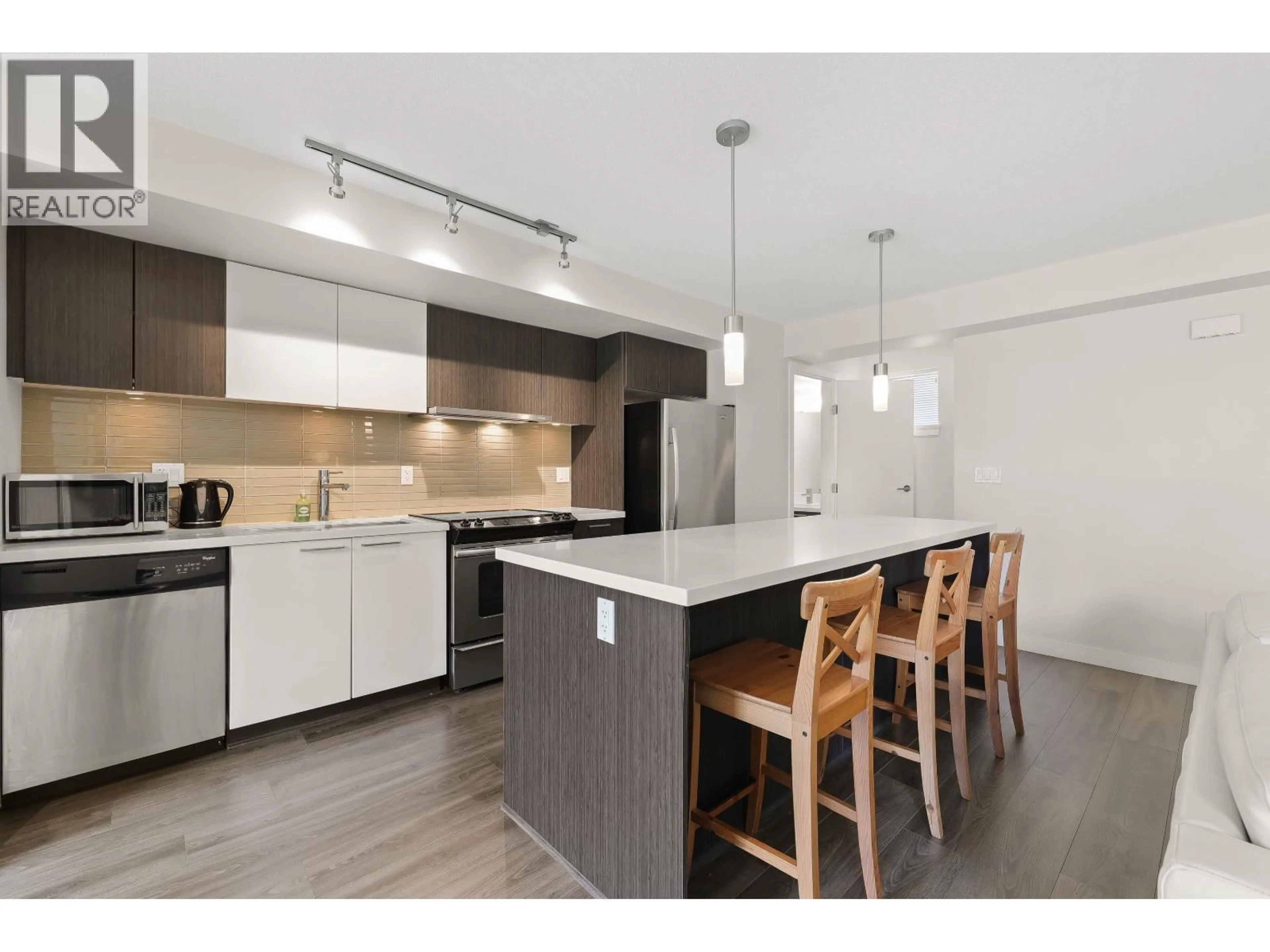 Open concept kitchen, wood/laminate floor for 311 - 618 LANGSIDE AVENUE, Coquitlam British Columbia V3J0B8